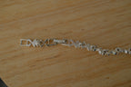 Avon Silver Flower Tennis Bracelet