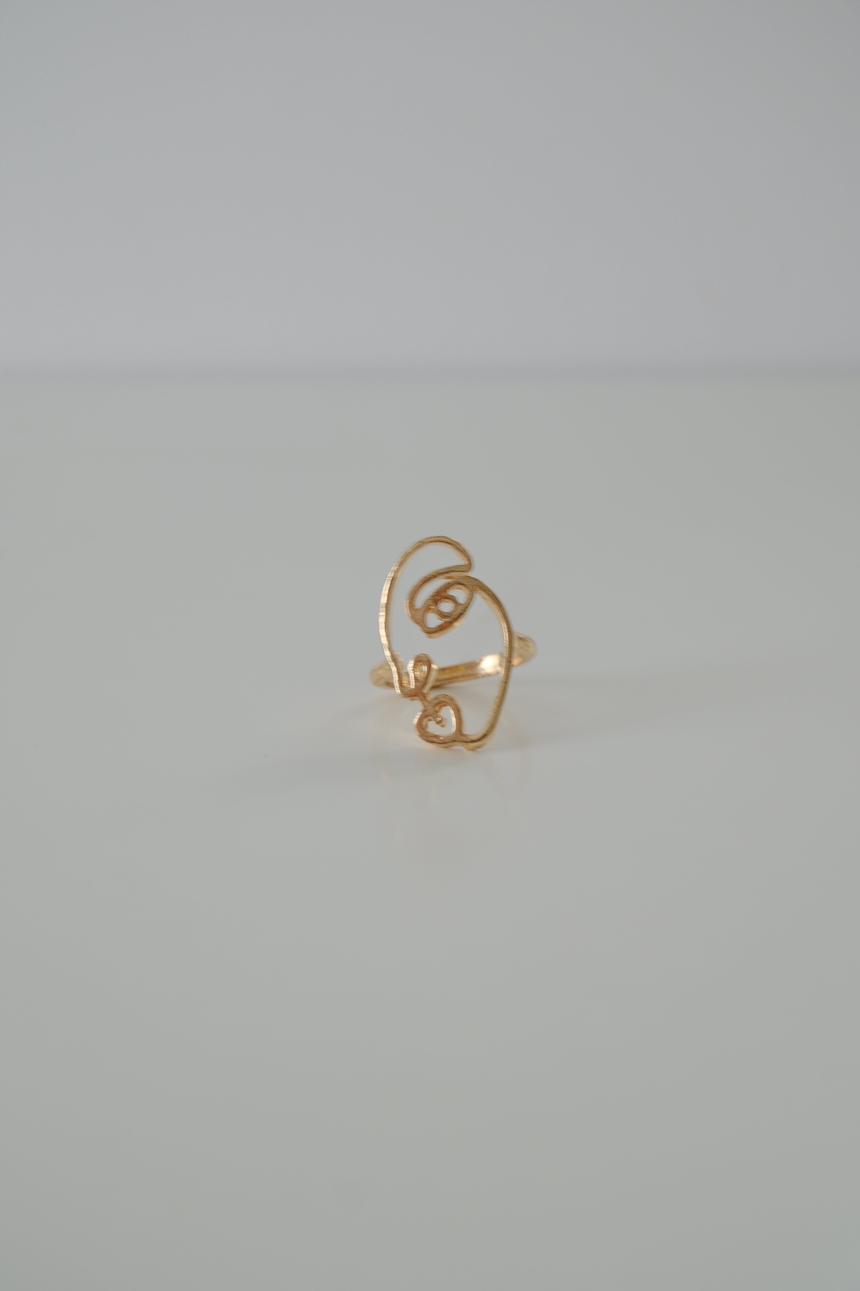Gold Tone Face Ring