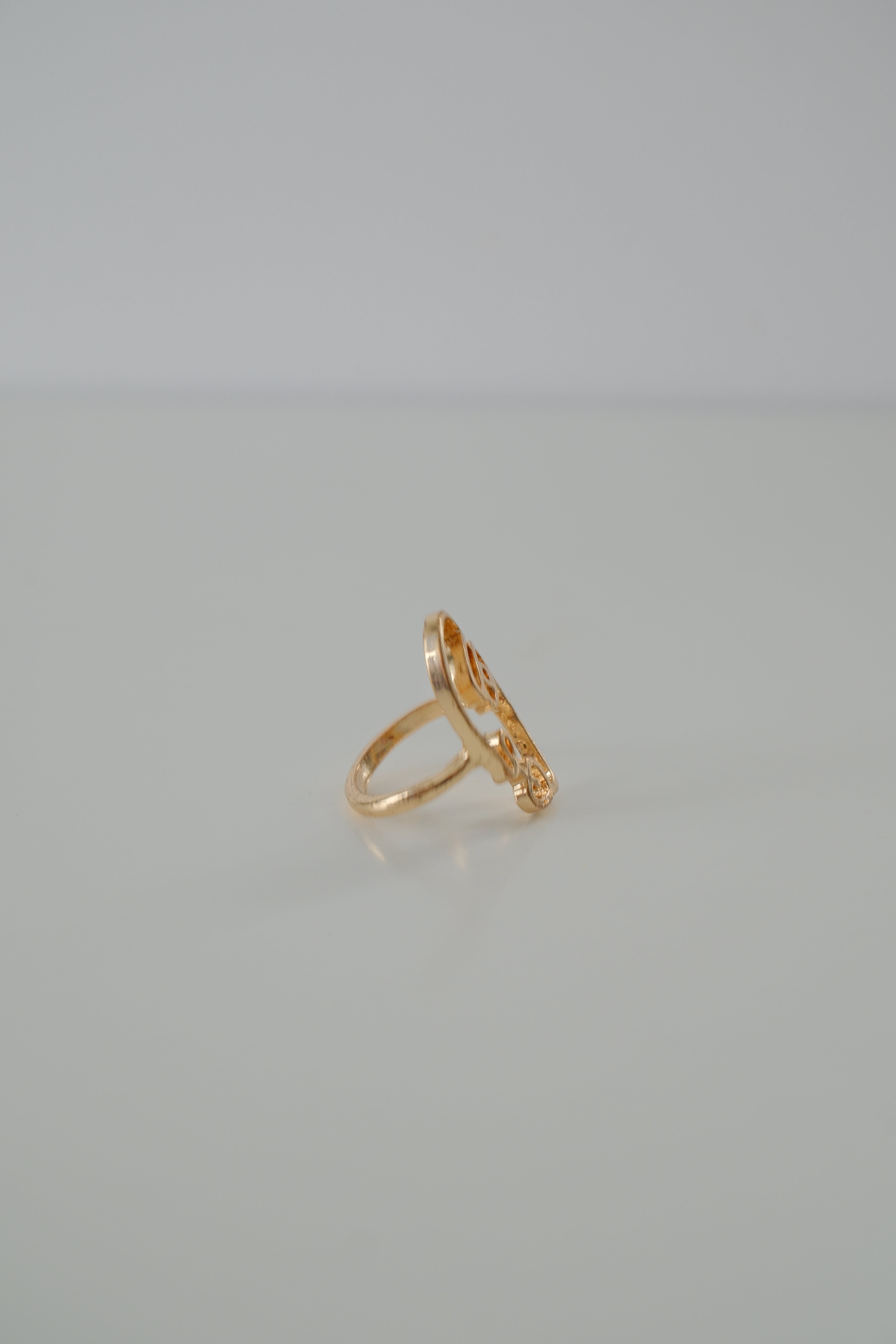Gold Tone Face Ring