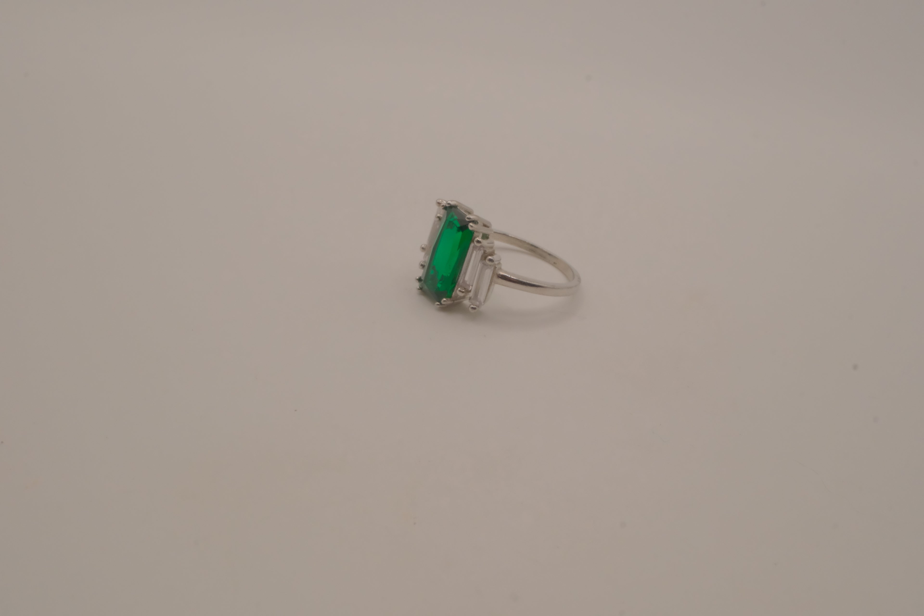 Sterling silver emerald-cut green gemstone ring