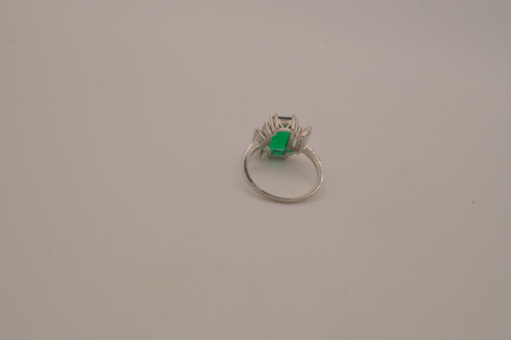 Sterling silver emerald-cut green gemstone ring
