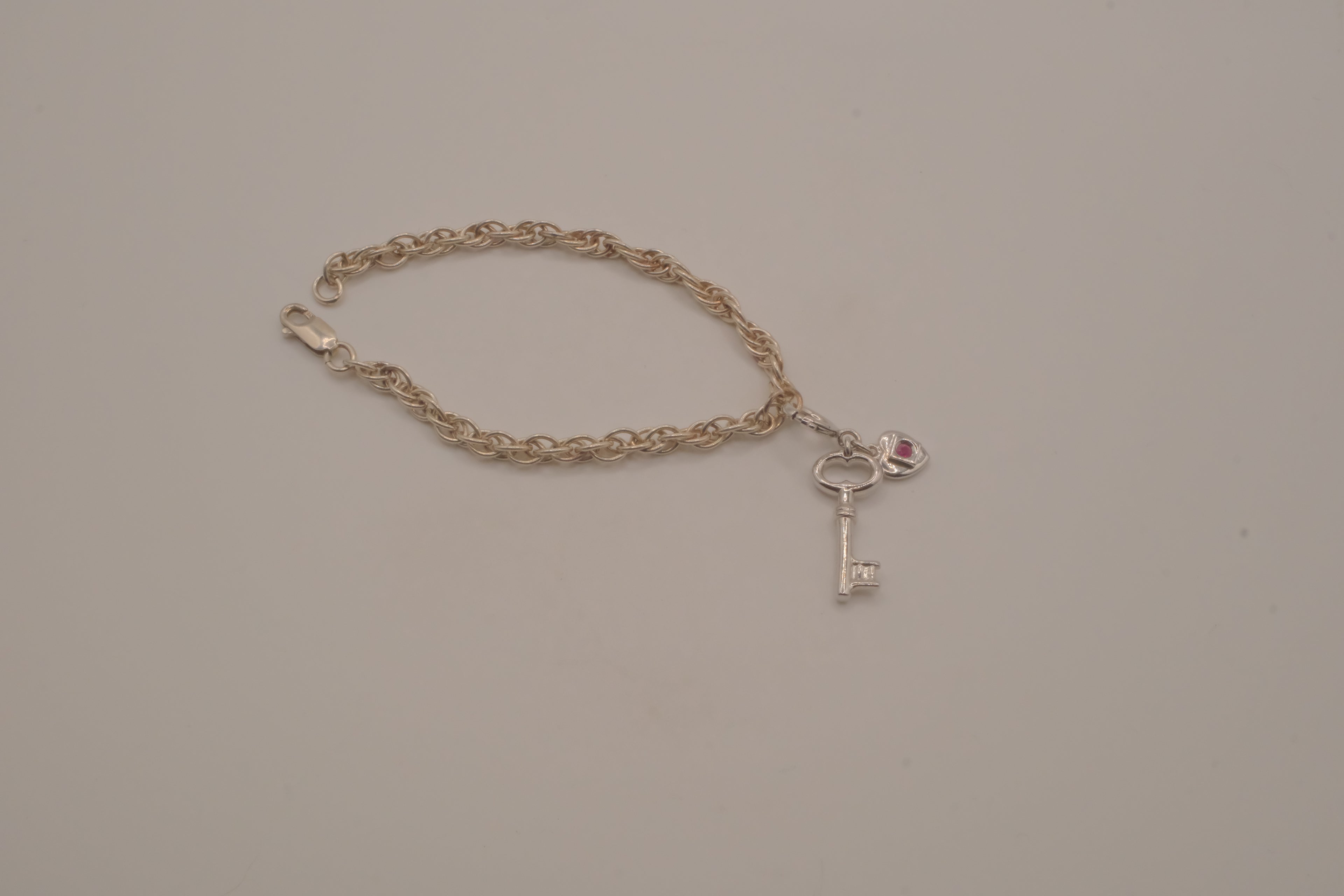Elle sterling silver rope chain charm bracelet