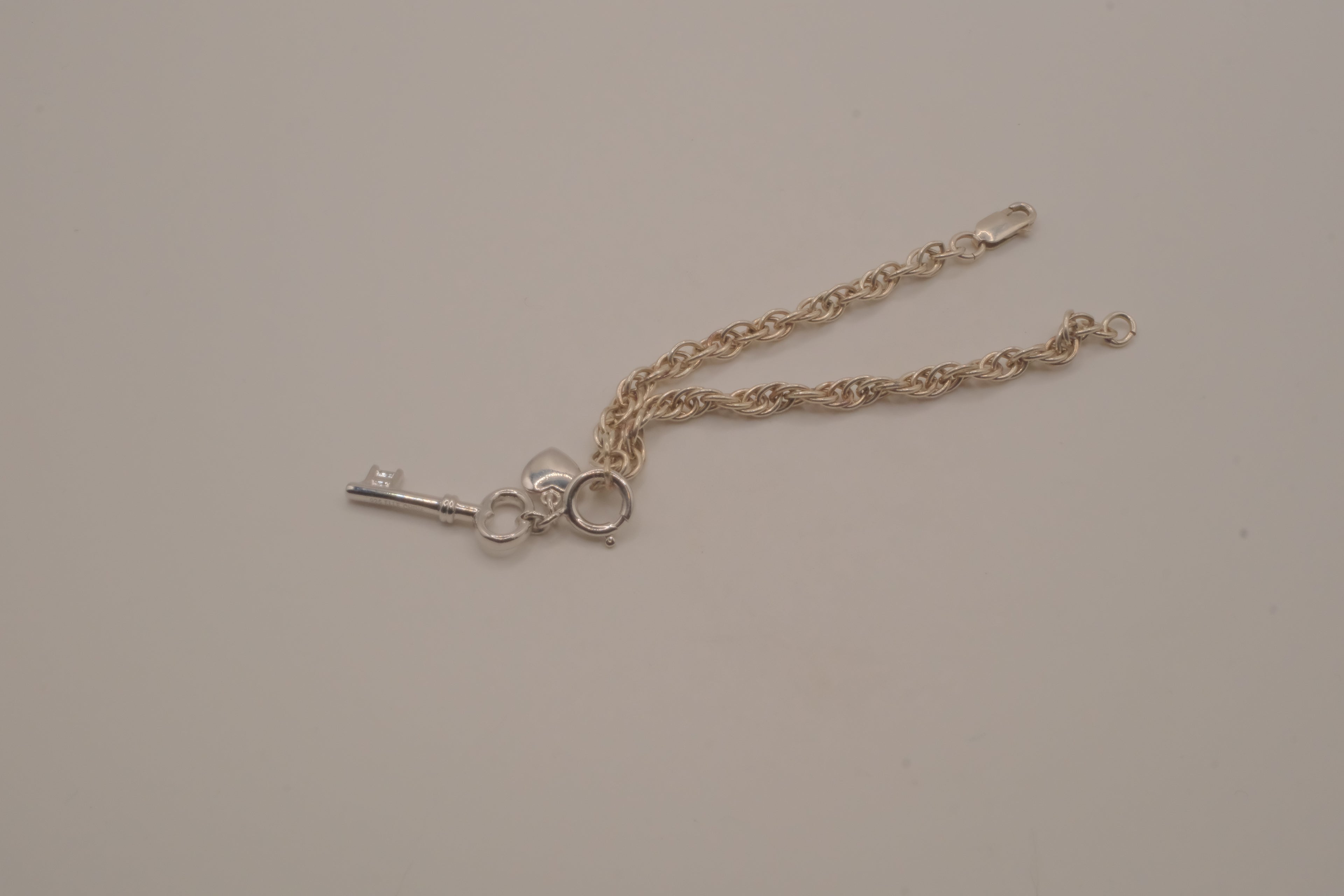 Elle sterling silver rope chain charm bracelet