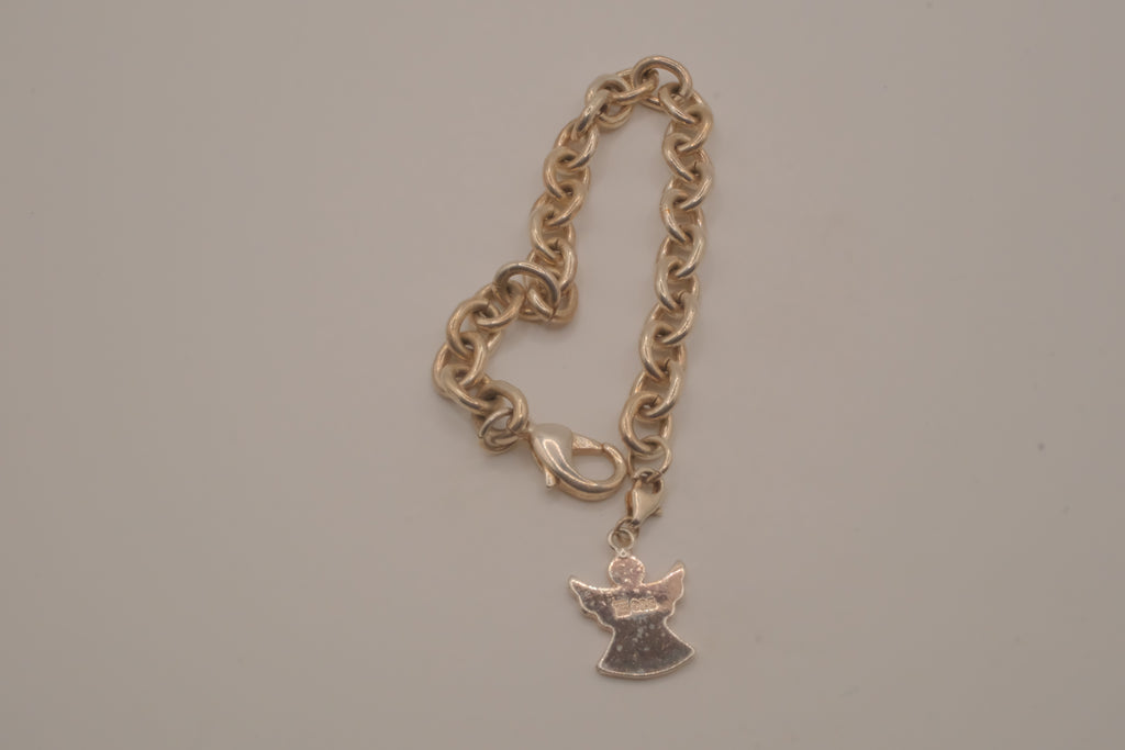 Sterling silver charm bracelet with an angel pendant