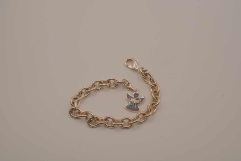 Sterling silver charm bracelet with an angel pendant