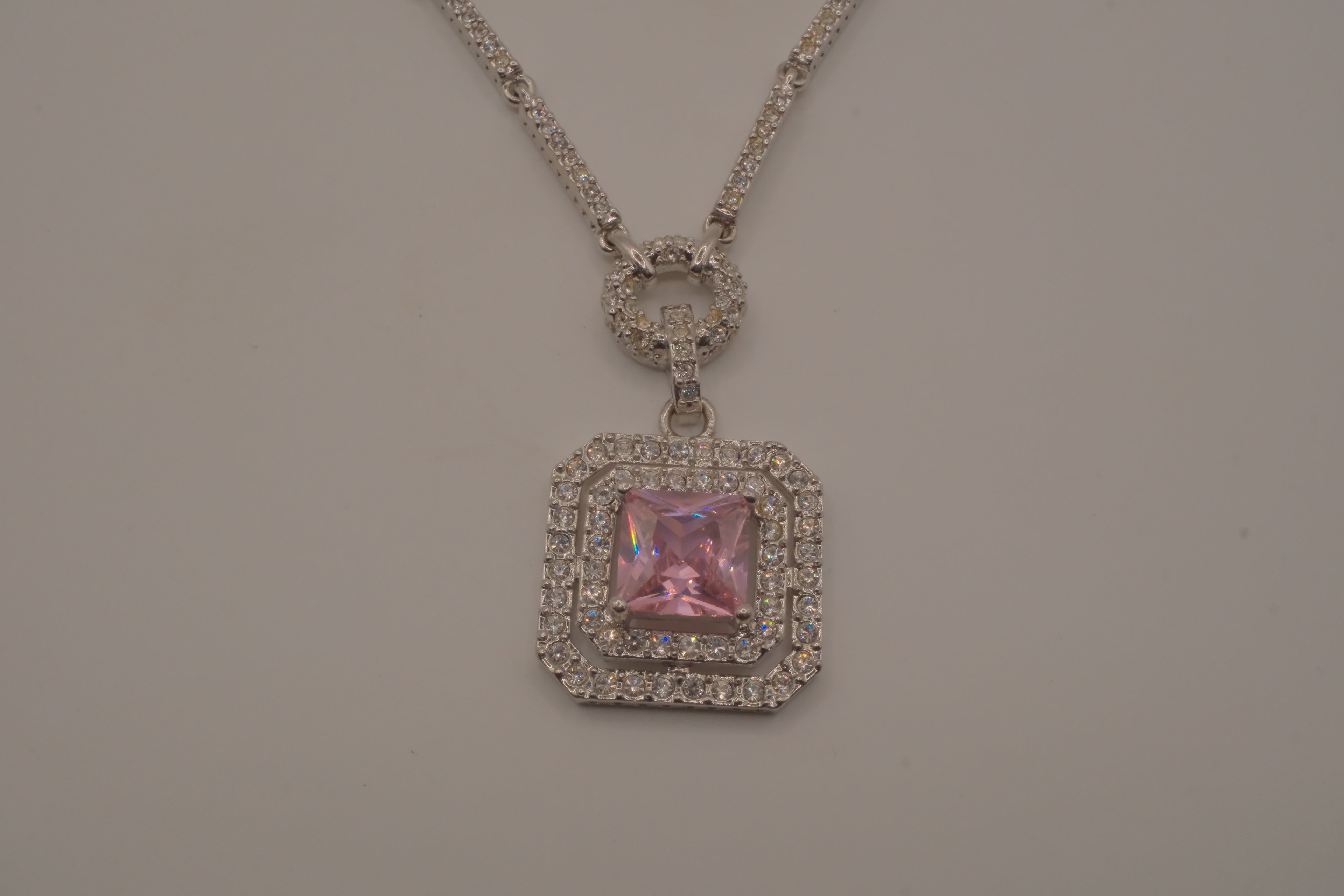Silver tone Pink stone halo pendant necklace