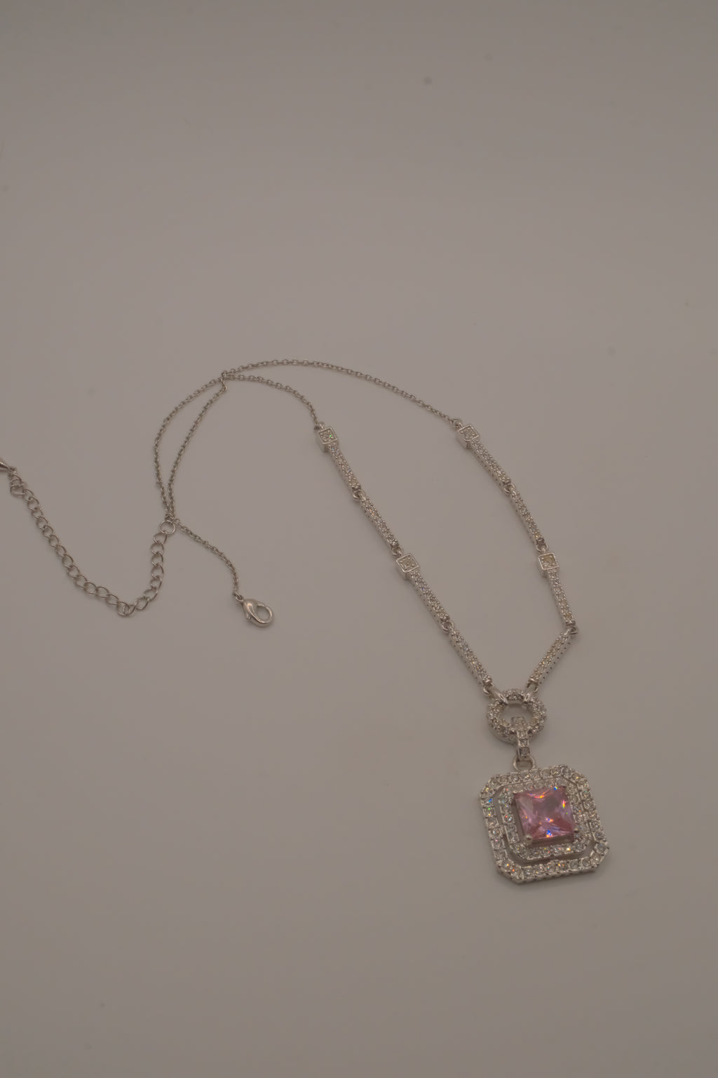 Silver tone Pink stone halo pendant necklace