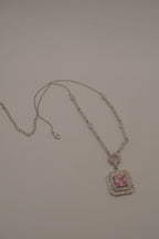 Silver tone Pink stone halo pendant necklace
