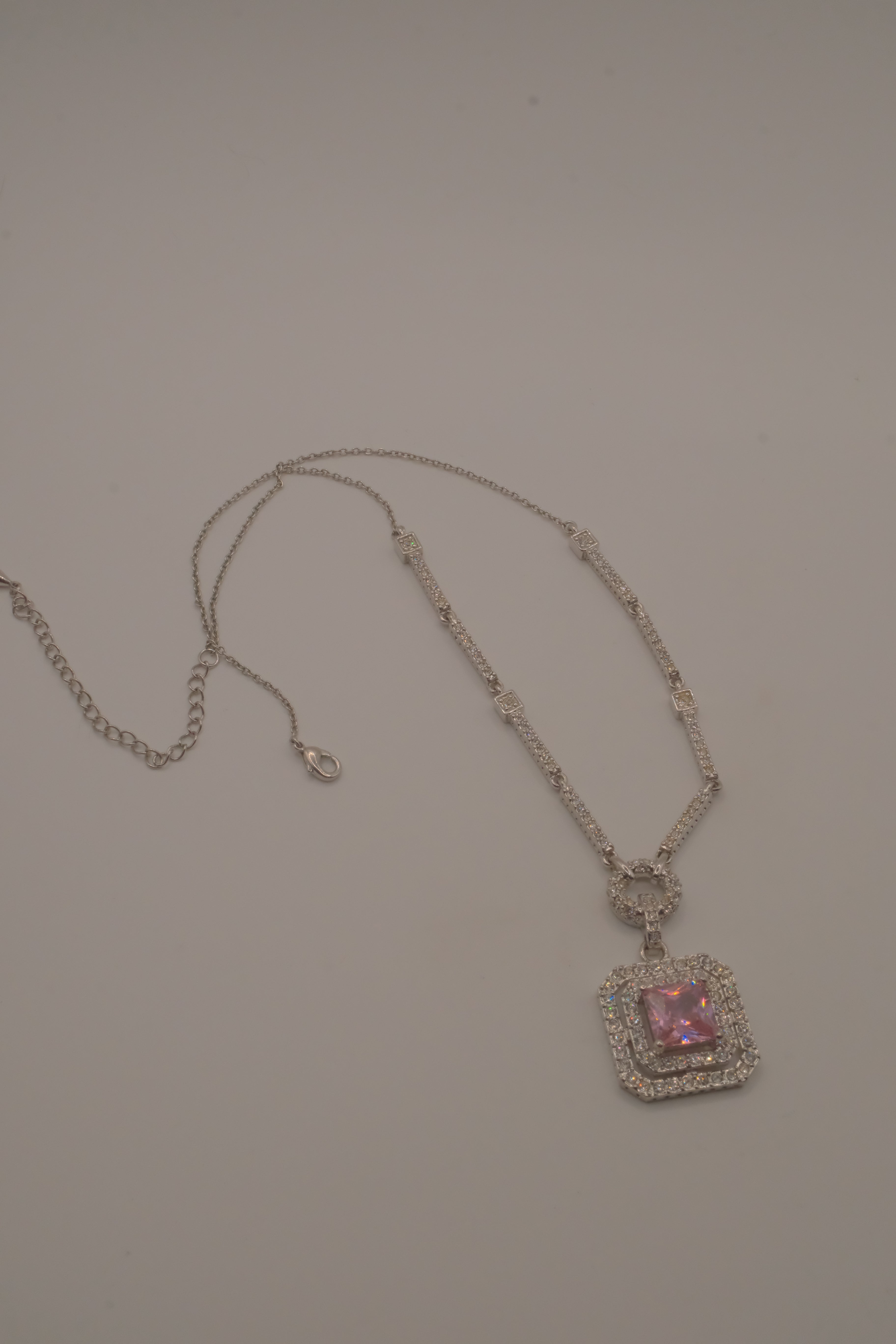 Silver tone Pink stone halo pendant necklace