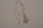 Silver tone Pink stone halo pendant necklace