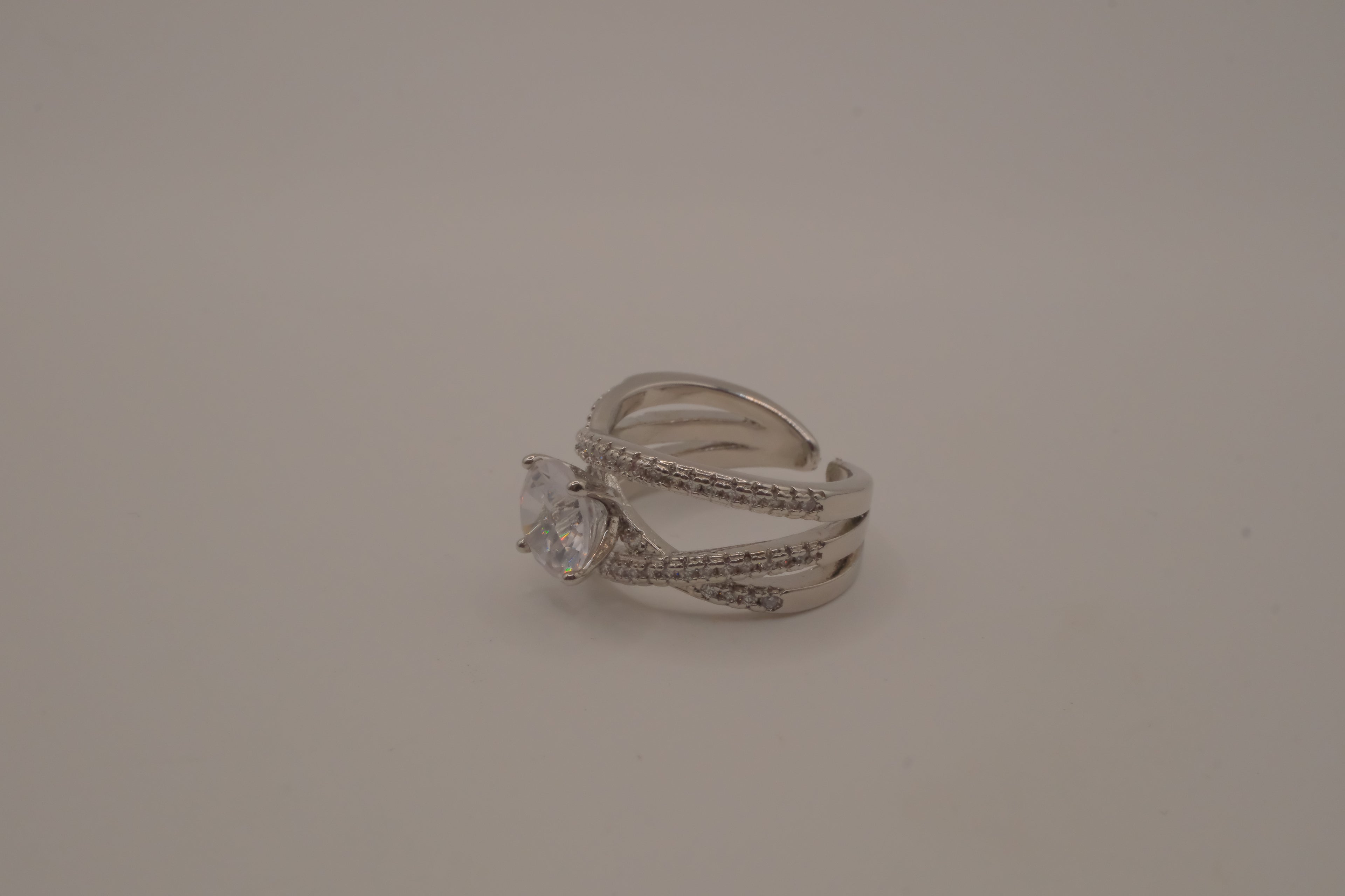 Sterling silver criss-cross crossover solitaire ring