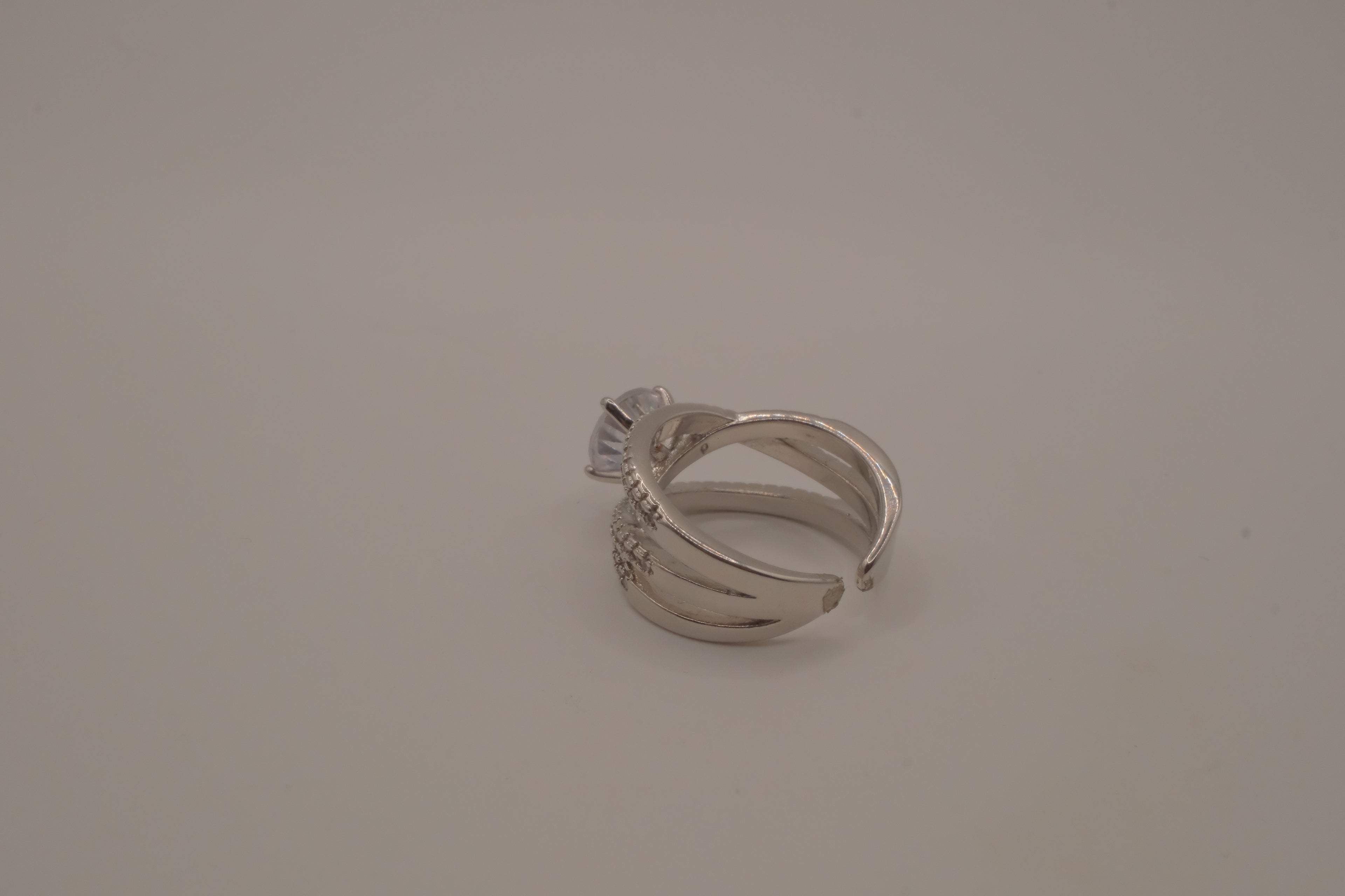 Sterling silver criss-cross crossover solitaire ring