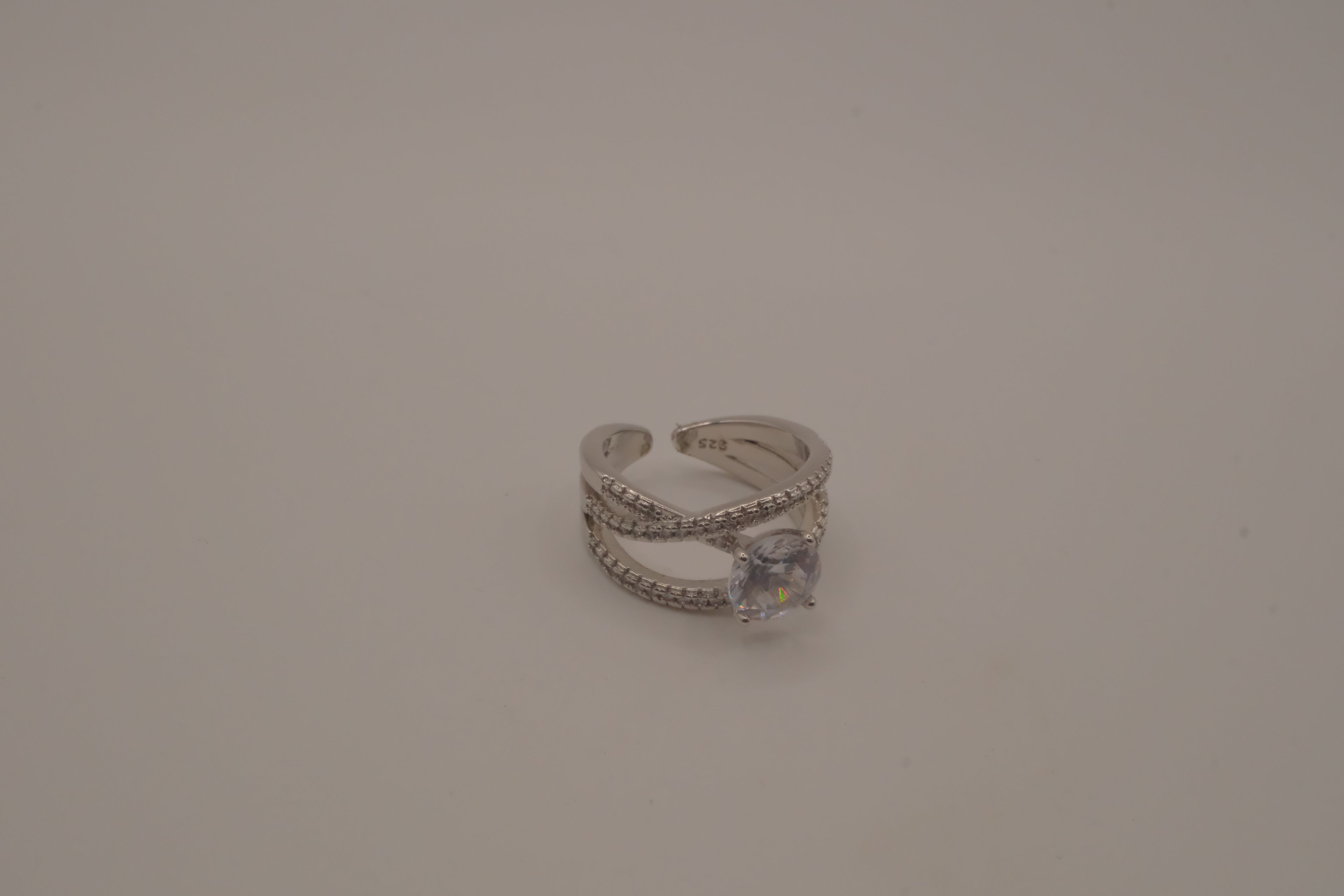 Sterling silver criss-cross crossover solitaire ring