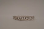 Sterling silver interlocking heart pattern hinged bangle bracelet