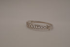 Sterling silver interlocking heart pattern hinged bangle bracelet