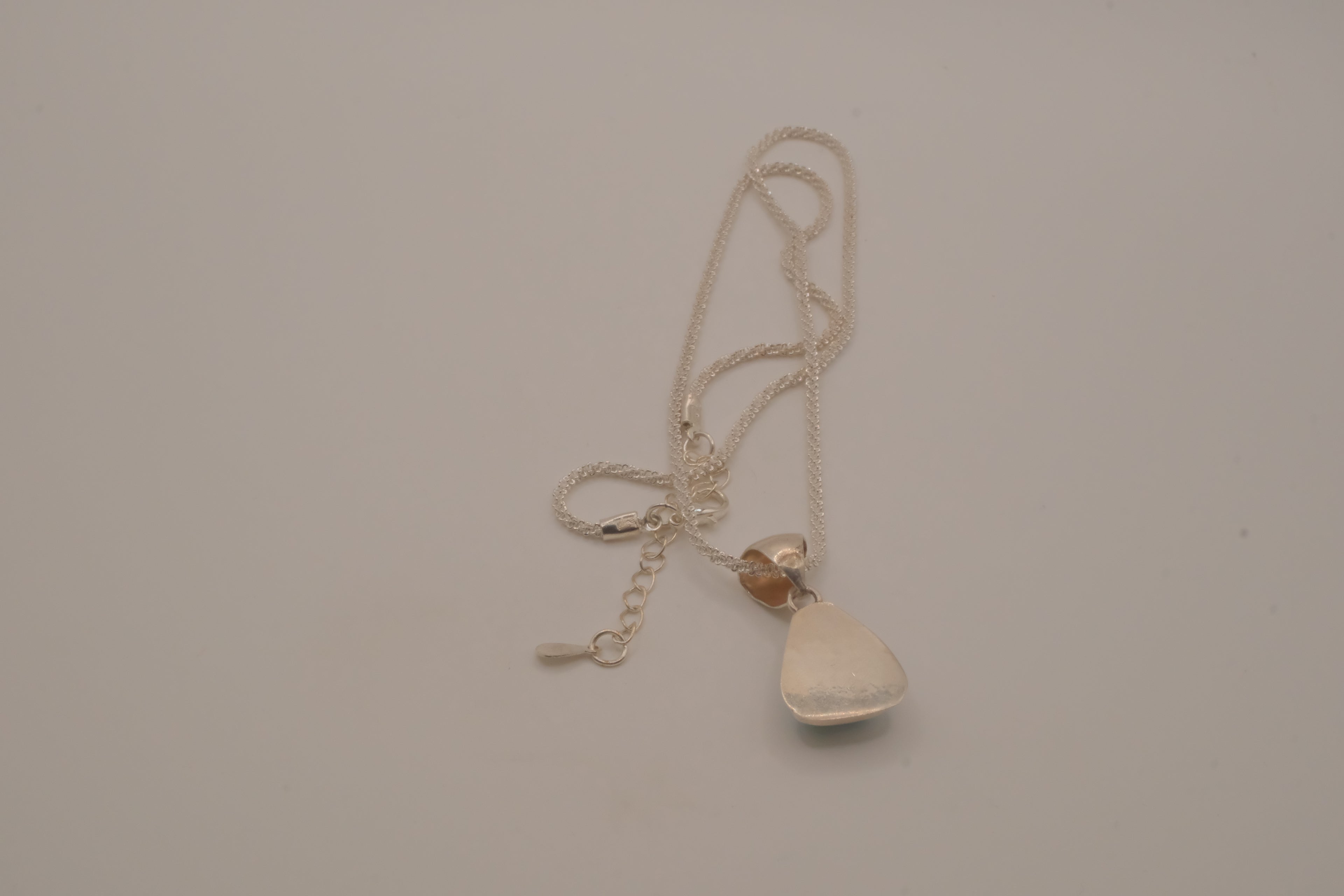 Sterling silver trilliant-cut Larimar pendant necklace