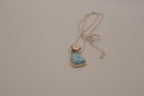 Sterling silver trilliant-cut Larimar pendant necklace