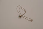 Sterling silver Larimar and Black Onyx sphere pendant necklace