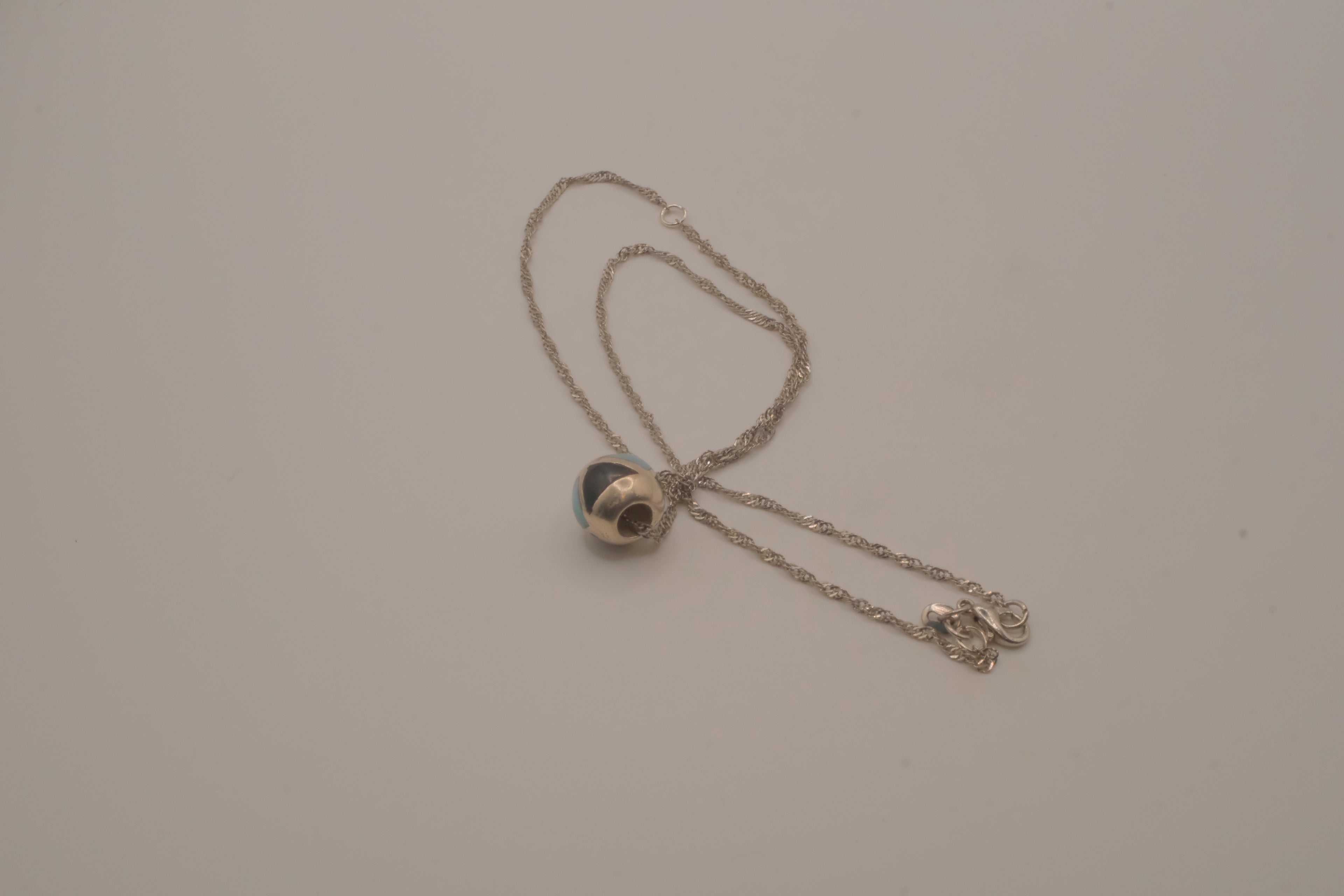 Sterling silver Larimar and Black Onyx sphere pendant necklace