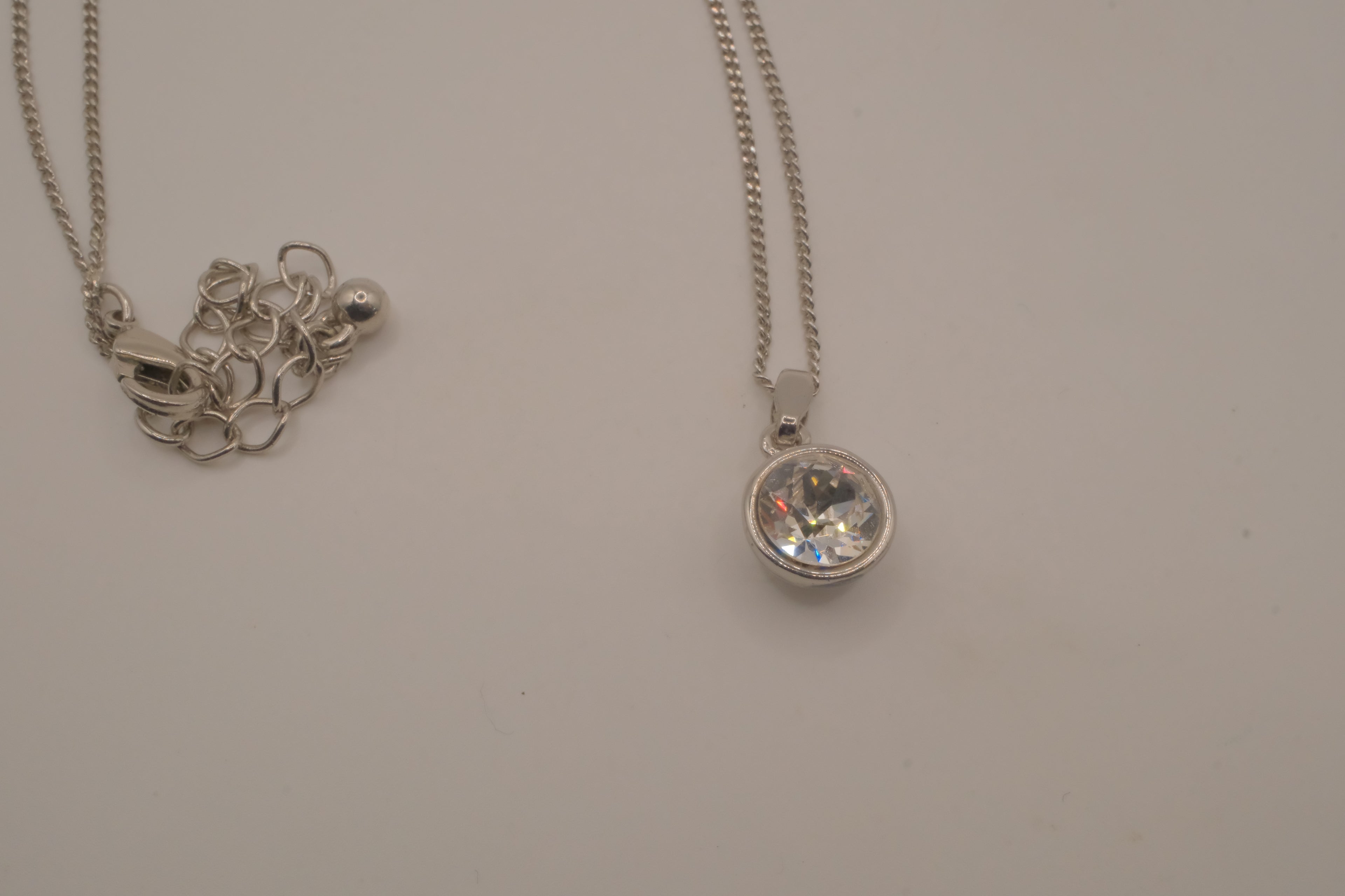 Elegant silver solitaire pendant necklace