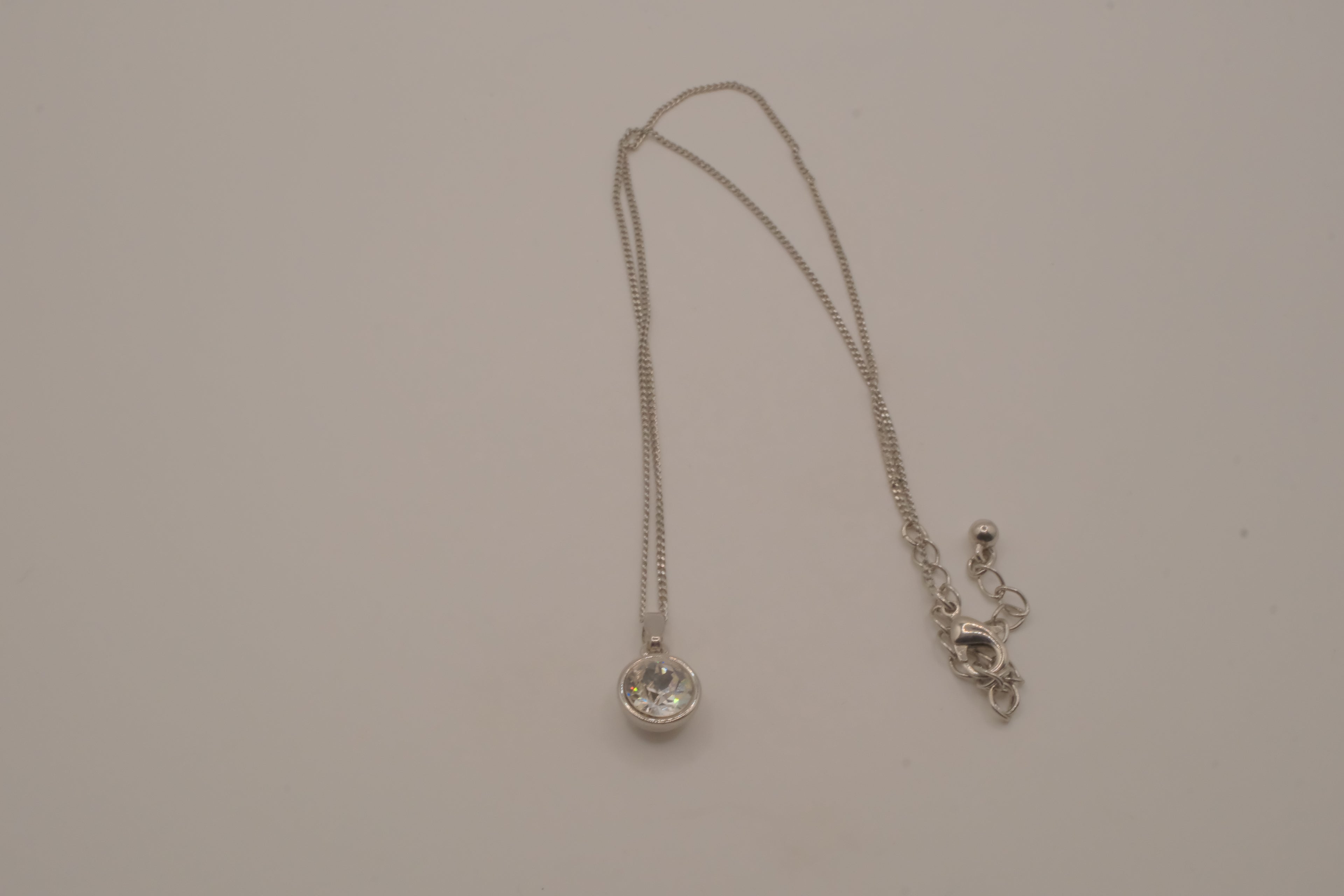 Elegant silver solitaire pendant necklace