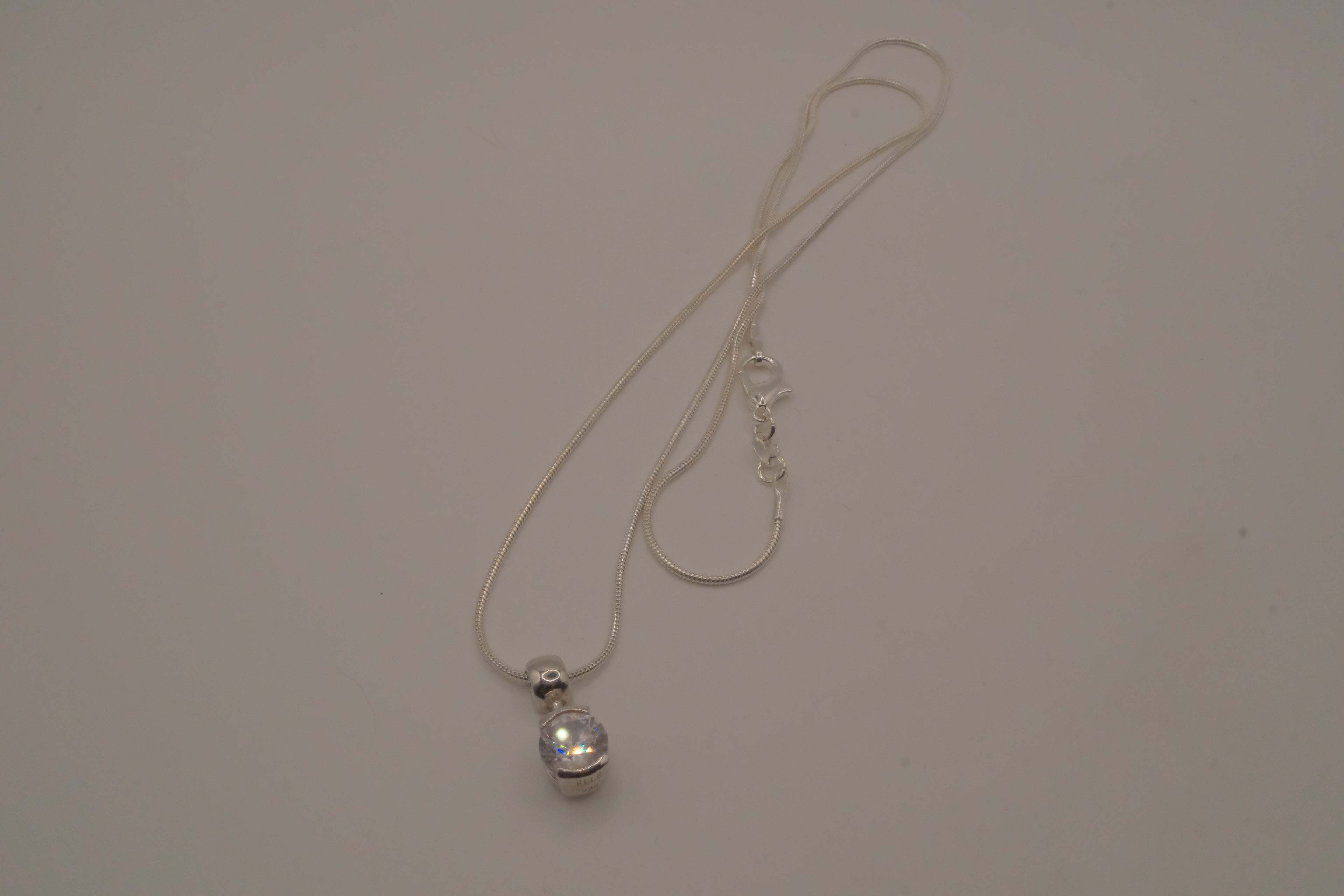 Elle Sterling silver dainty round white stone pendant necklace