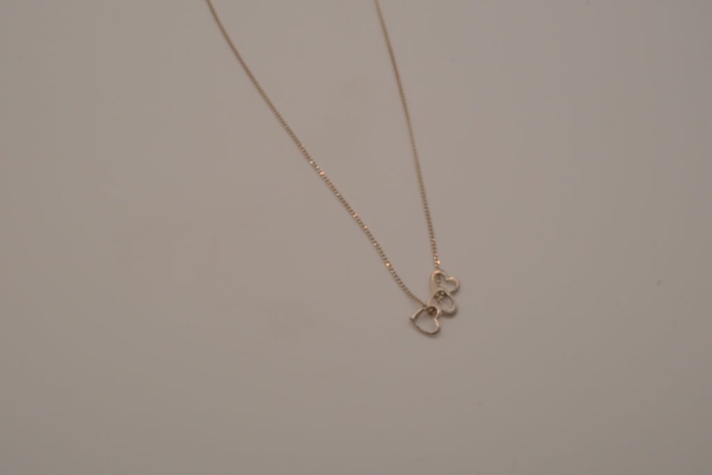 Sterling silver triple heart pendant necklace