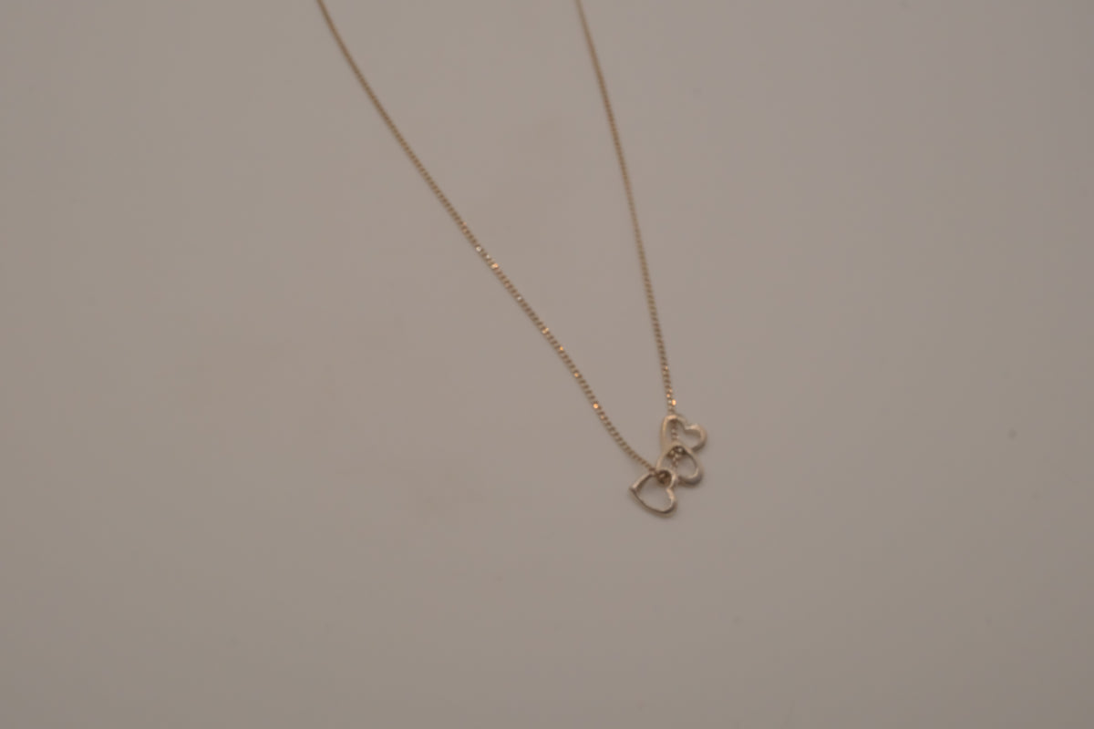 Sterling silver triple heart pendant necklace