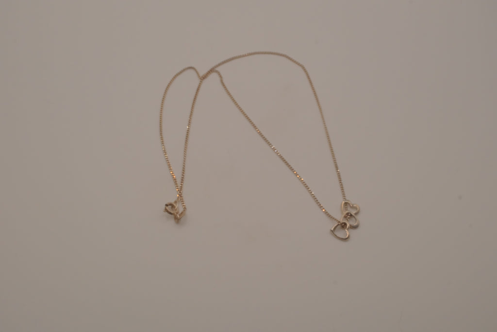 Sterling silver triple heart pendant necklace