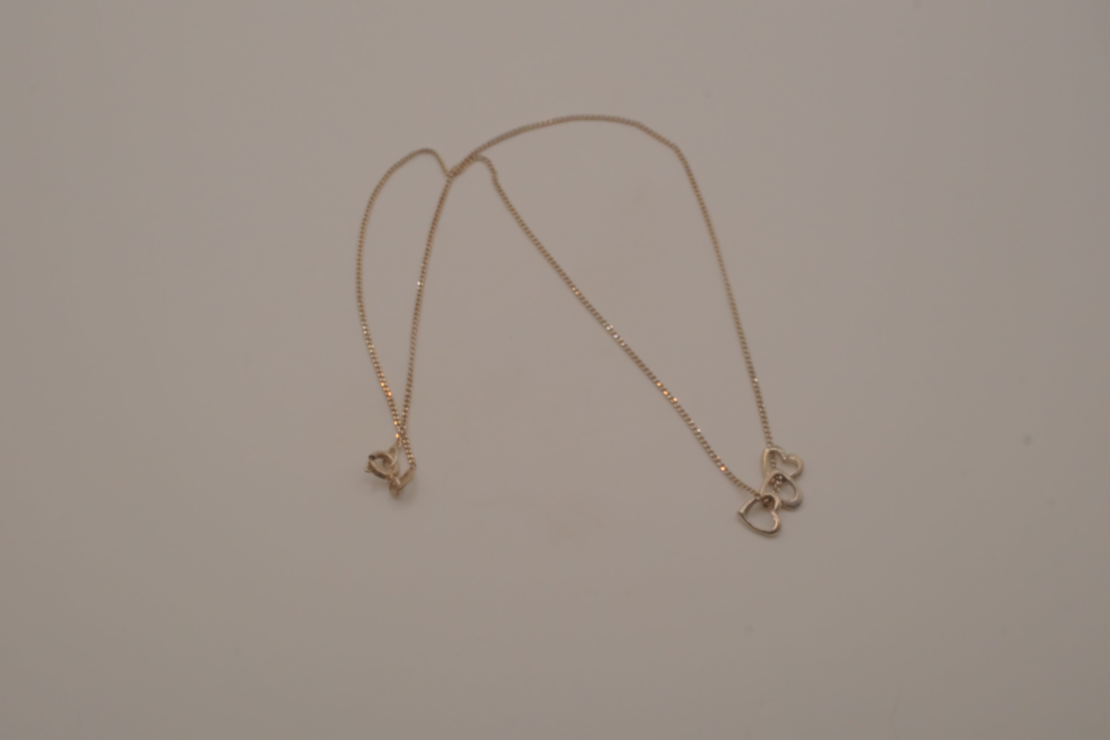 Sterling silver triple heart pendant necklace