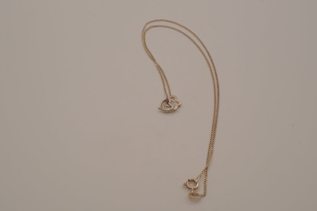 Sterling silver triple heart pendant necklace