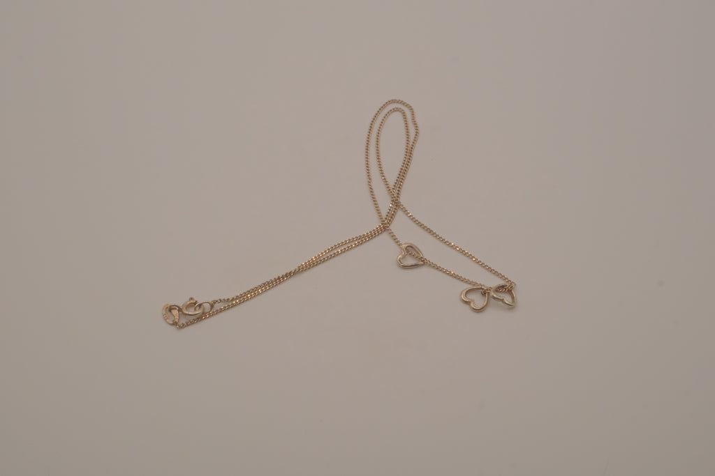 Sterling silver triple heart pendant necklace