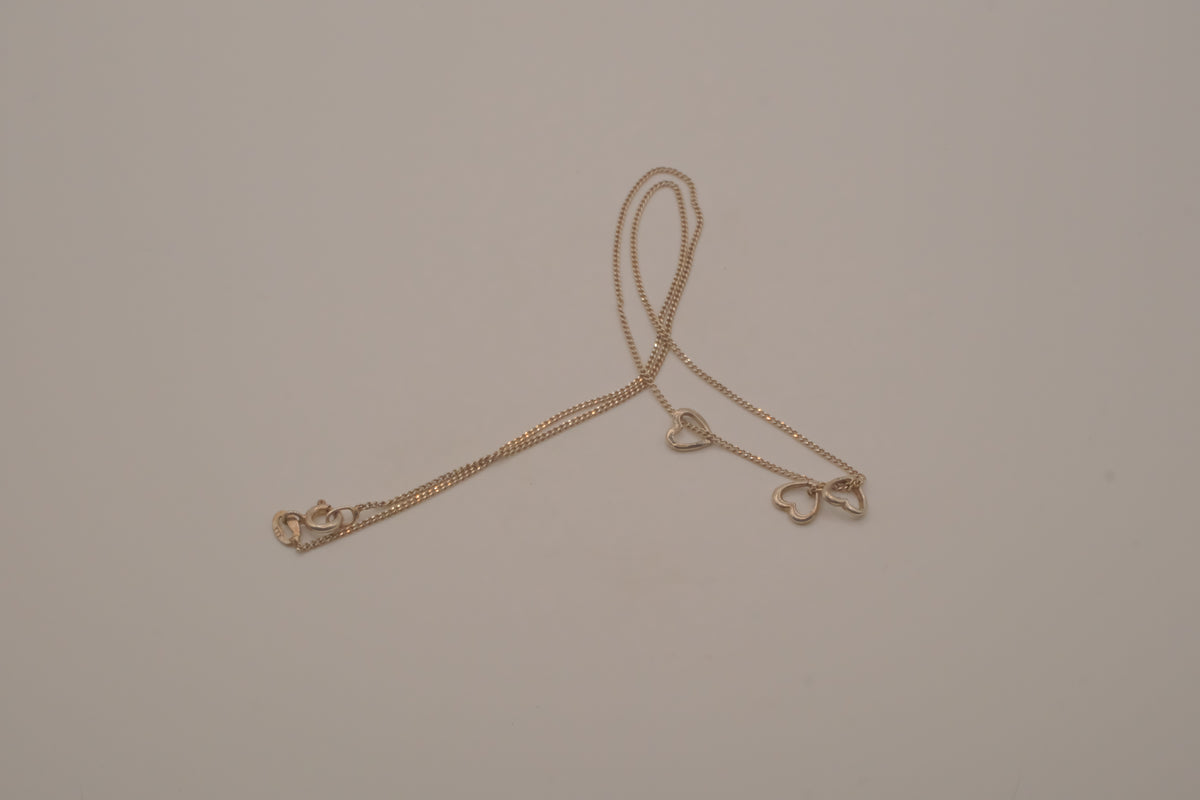 Sterling silver triple heart pendant necklace