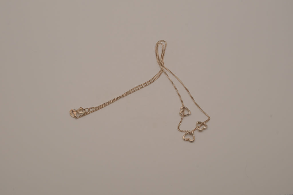 Sterling silver triple heart pendant necklace