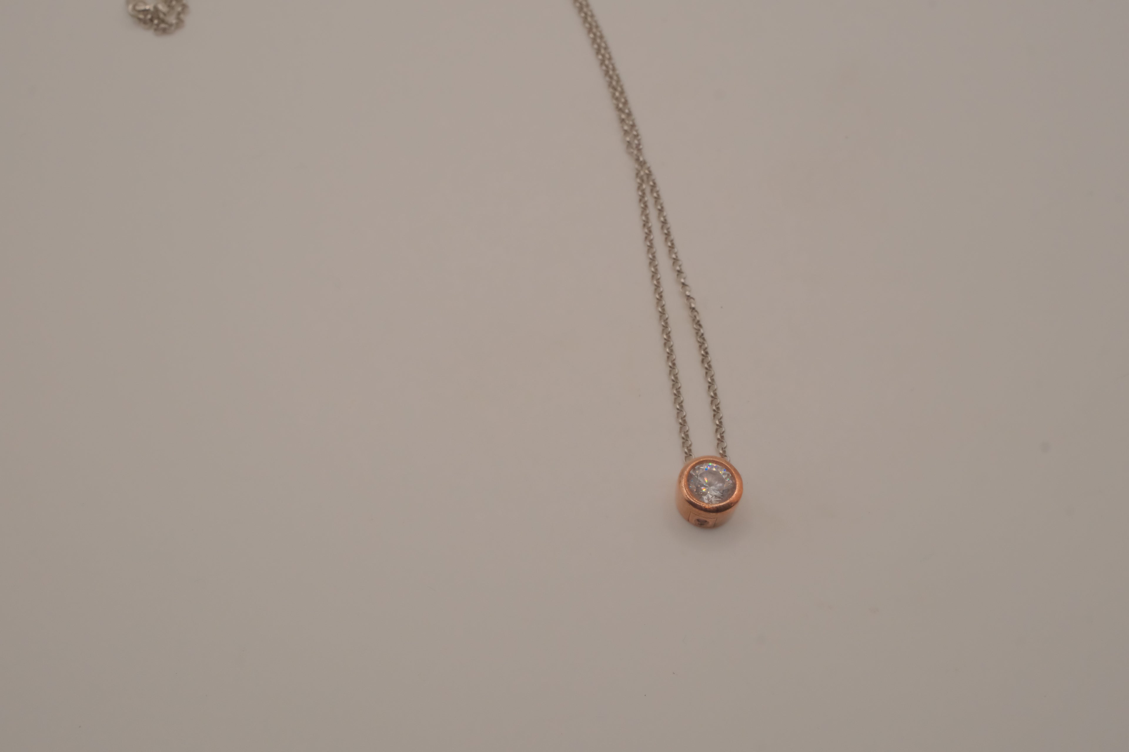 Elle Sterling silver rose gold bezel-set round solitaire pendant necklace