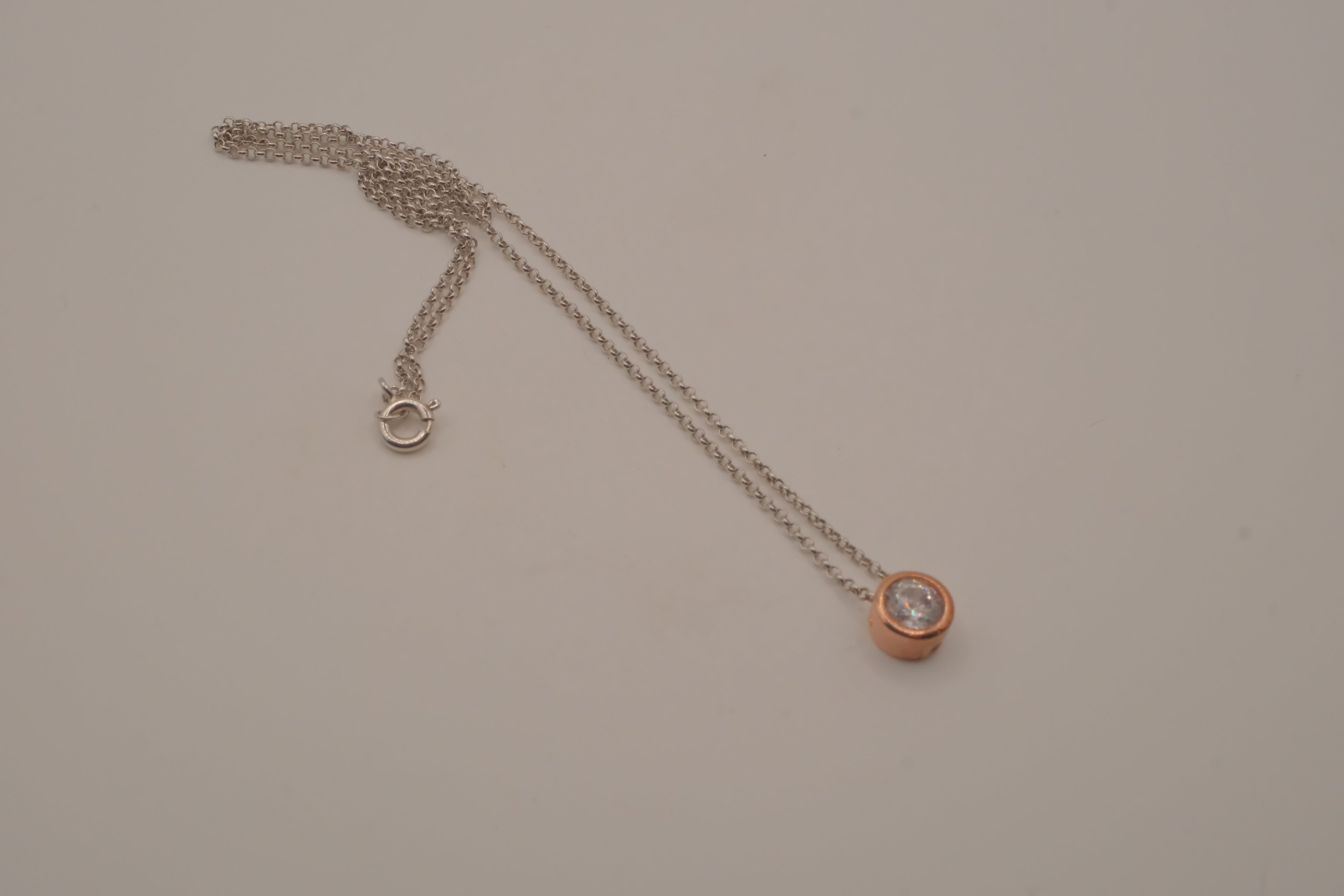 Elle Sterling silver rose gold bezel-set round solitaire pendant necklace