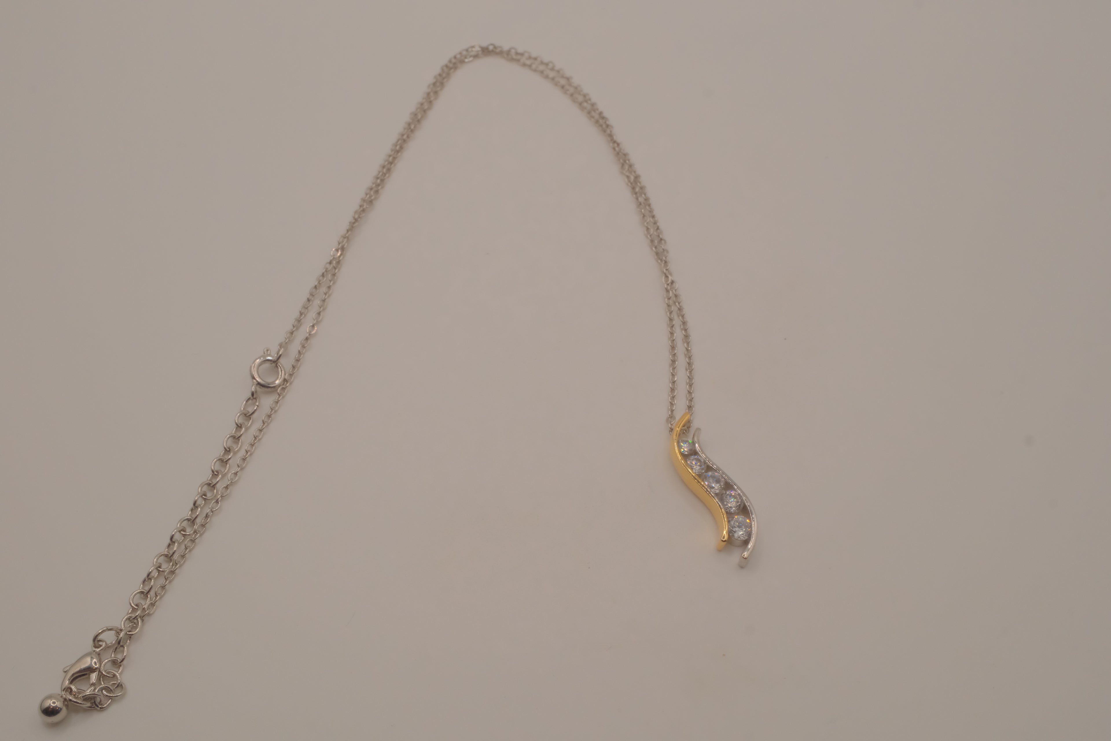Sterling silver two tone journey-style pendant necklace