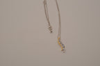Sterling silver two tone journey-style pendant necklace