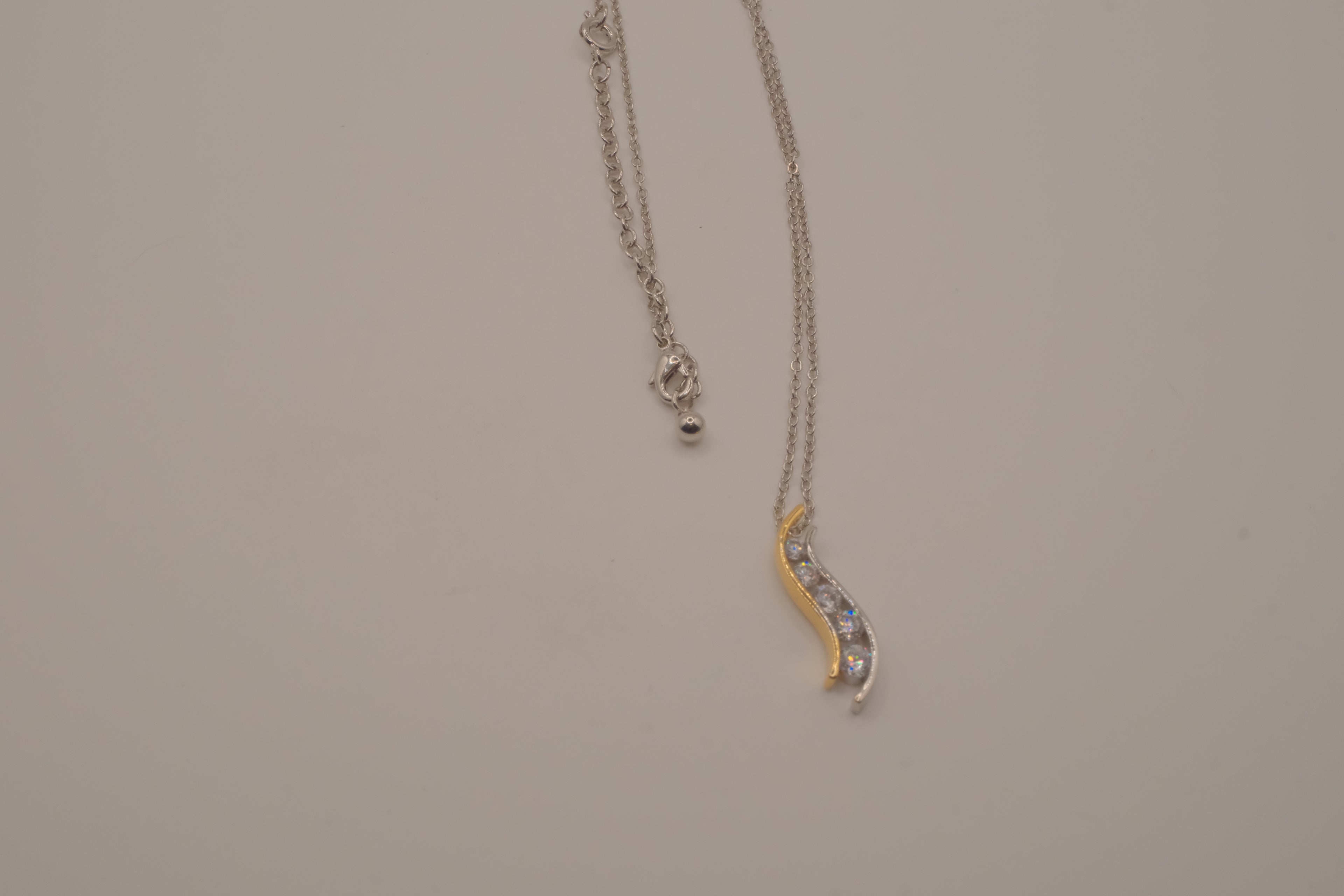 Sterling silver two tone journey-style pendant necklace