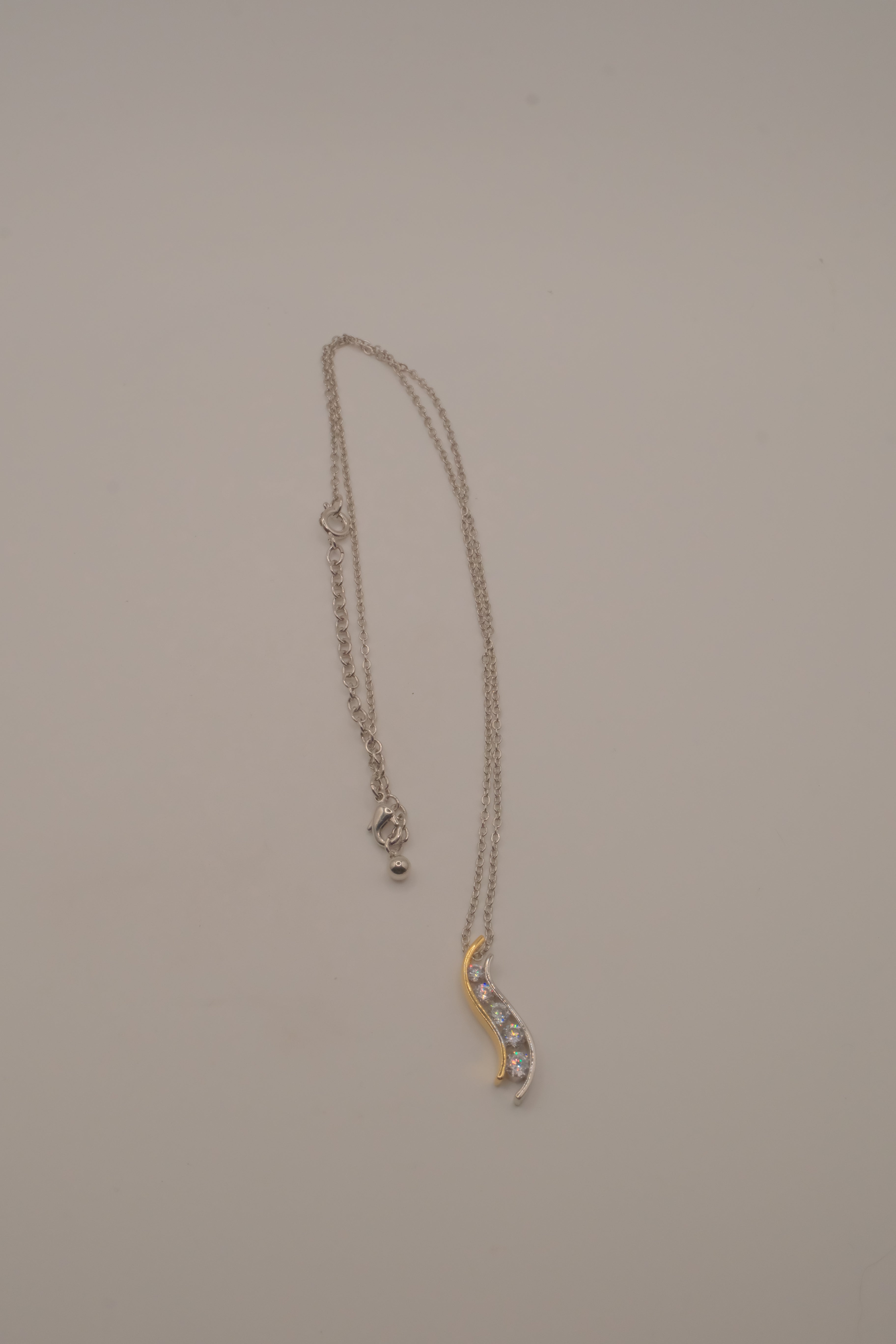 Sterling silver two tone journey-style pendant necklace