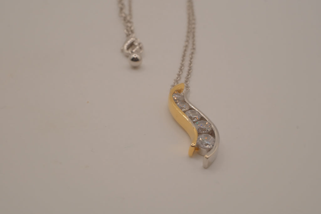 Sterling silver two tone journey-style pendant necklace