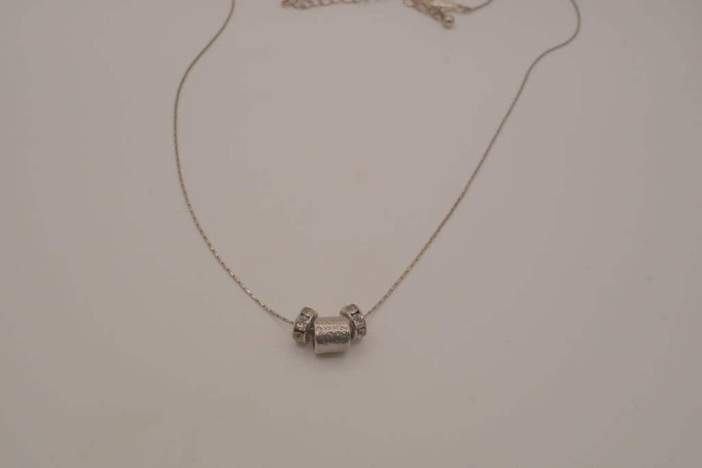 Sterling silver barrel-shaped slider pendant necklace