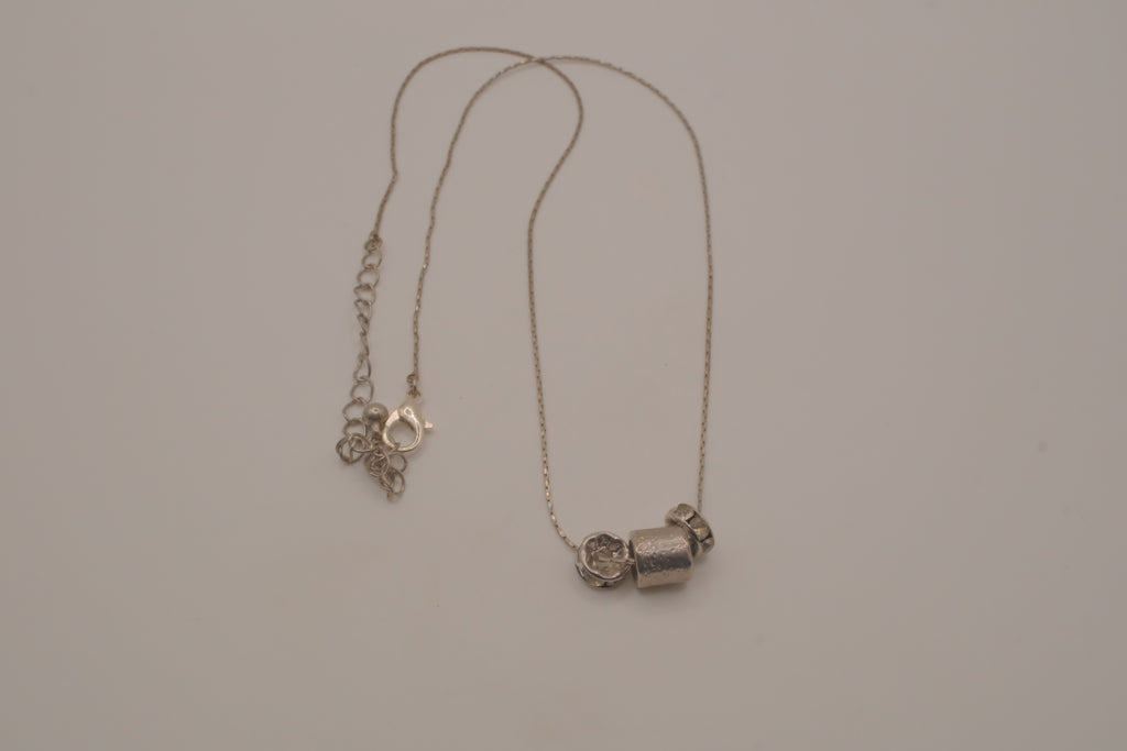 Sterling silver barrel-shaped slider pendant necklace