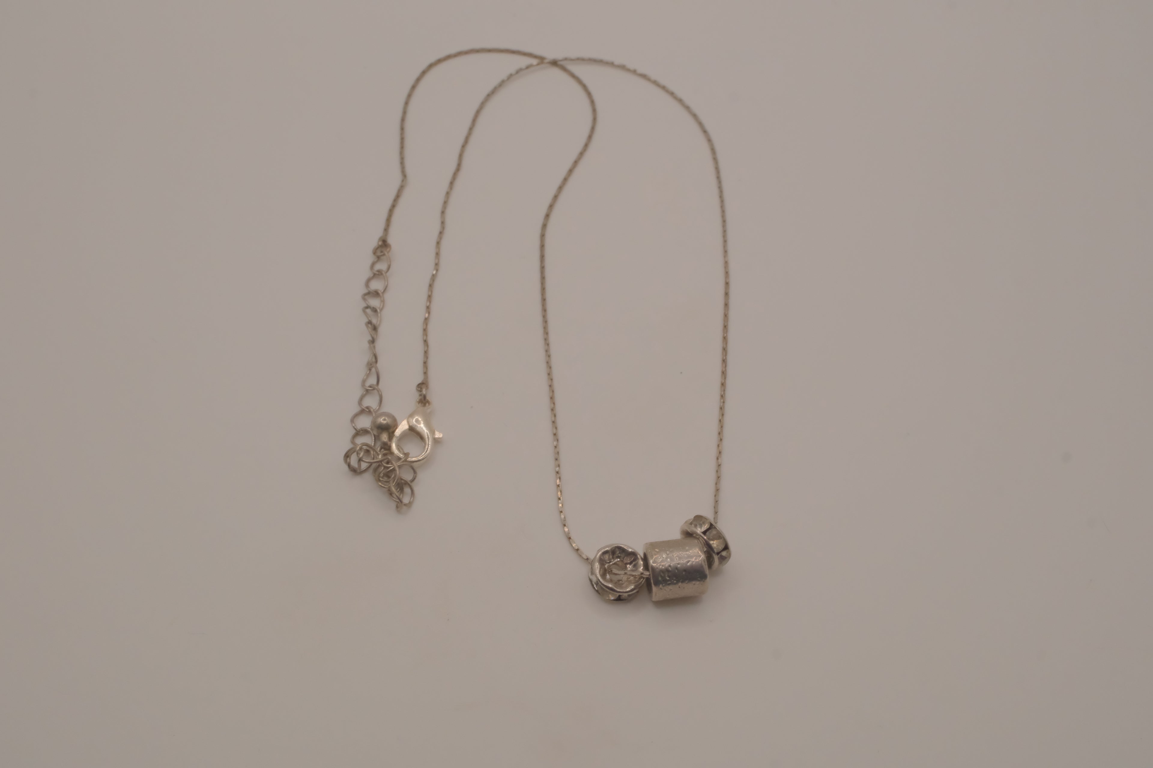 Sterling silver barrel-shaped slider pendant necklace
