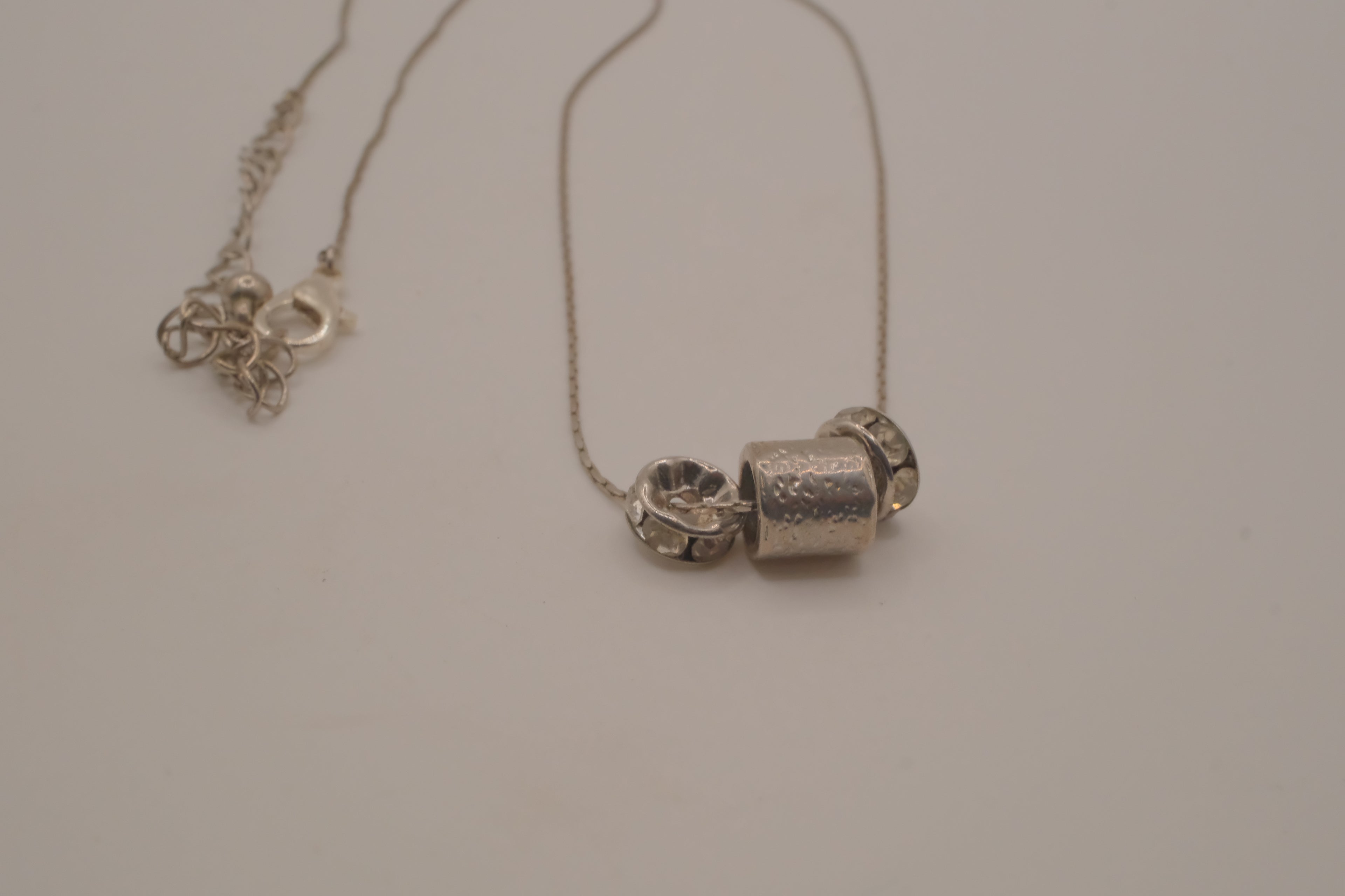 Sterling silver barrel-shaped slider pendant necklace