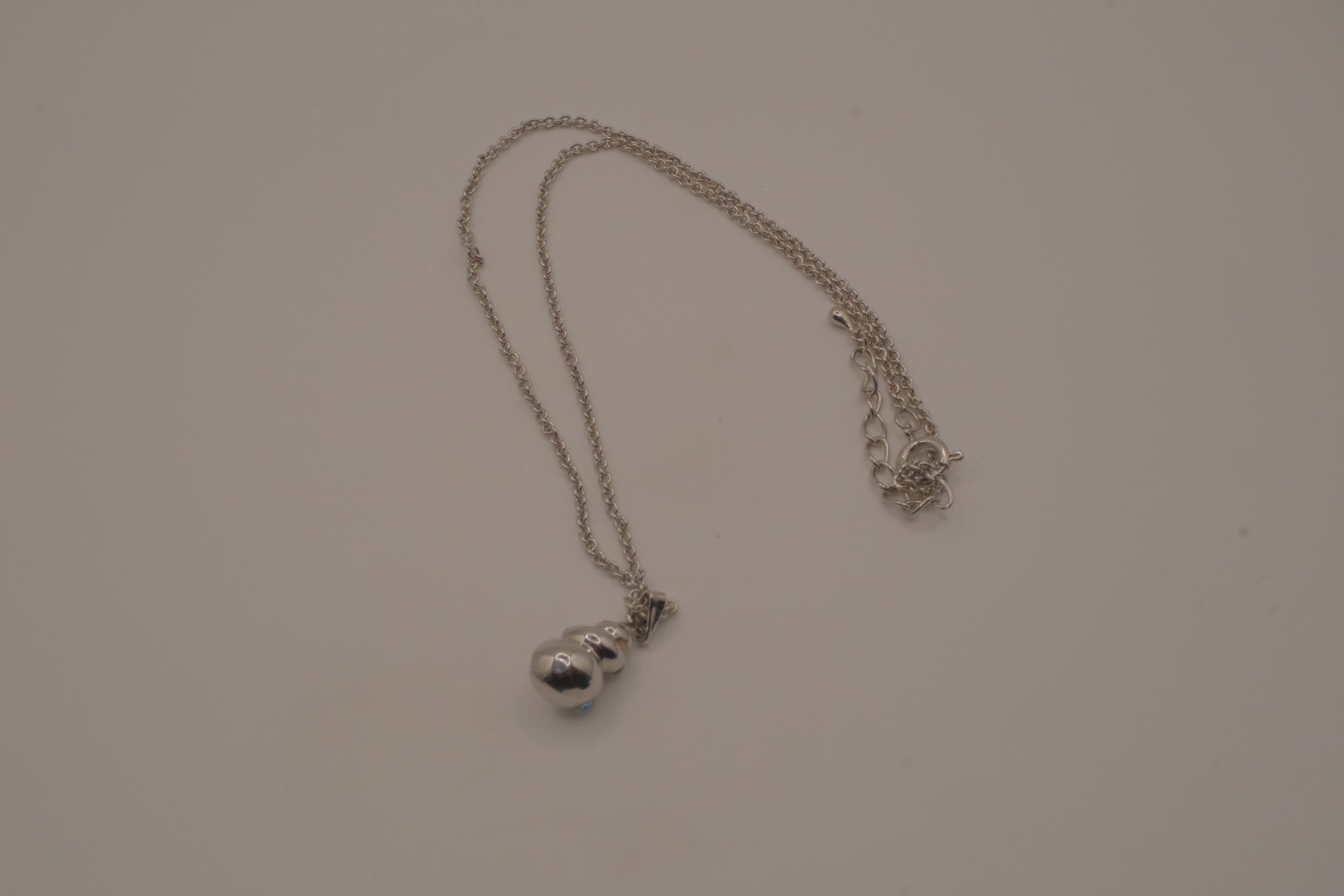 Blue swirling sea shell pendant necklace