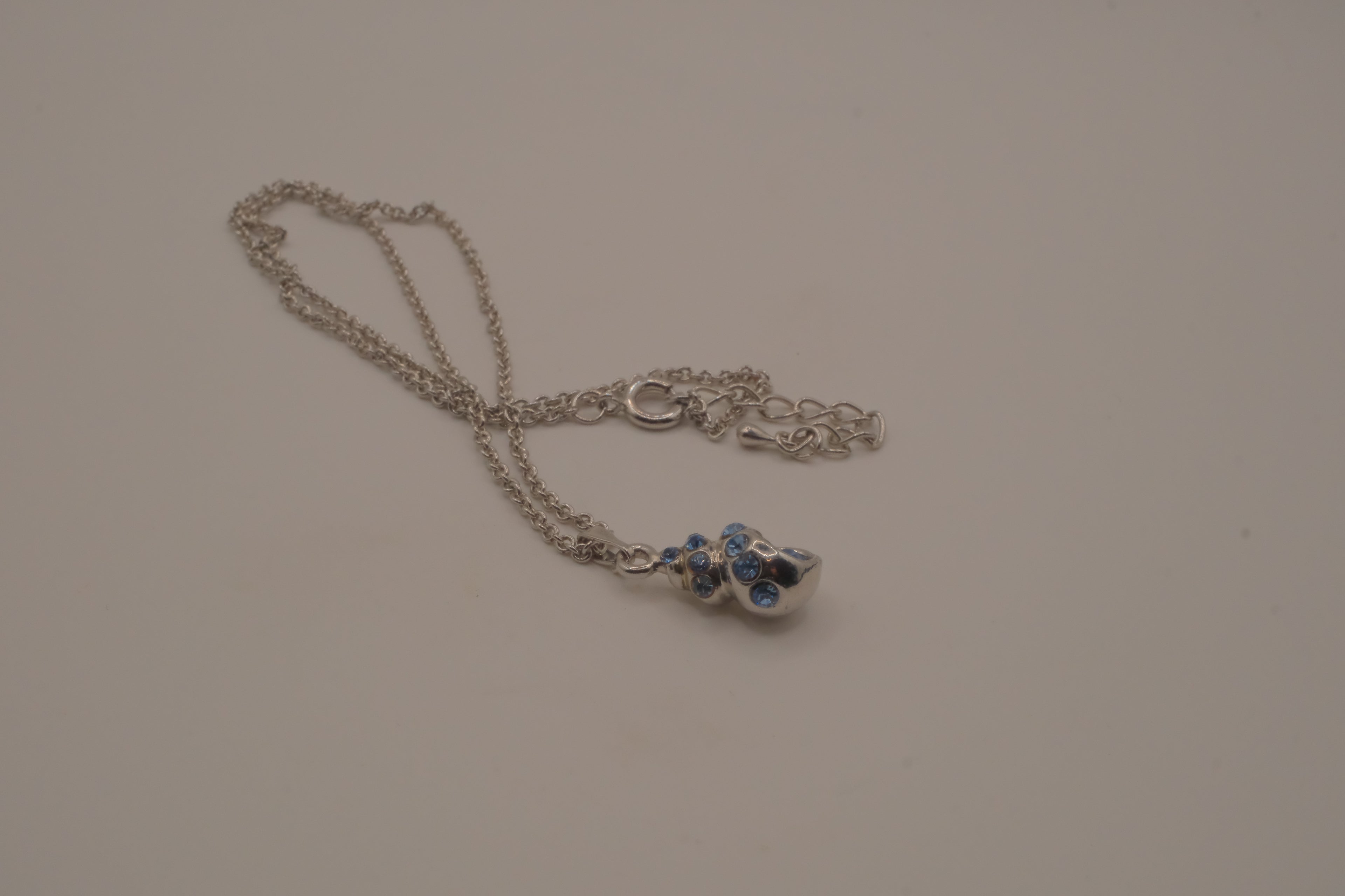 Blue swirling sea shell pendant necklace