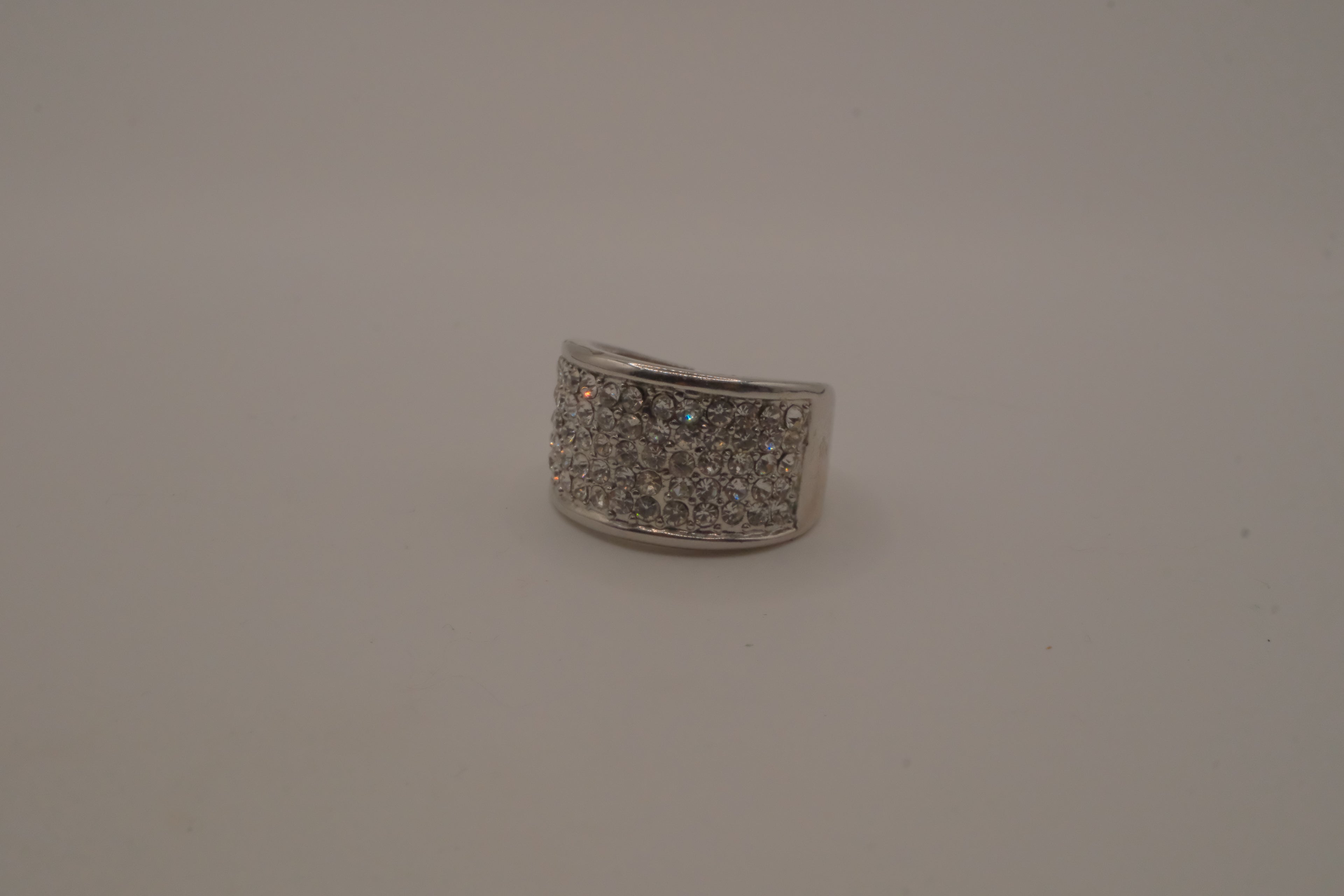 Silver tone wide pave cocktail band ring