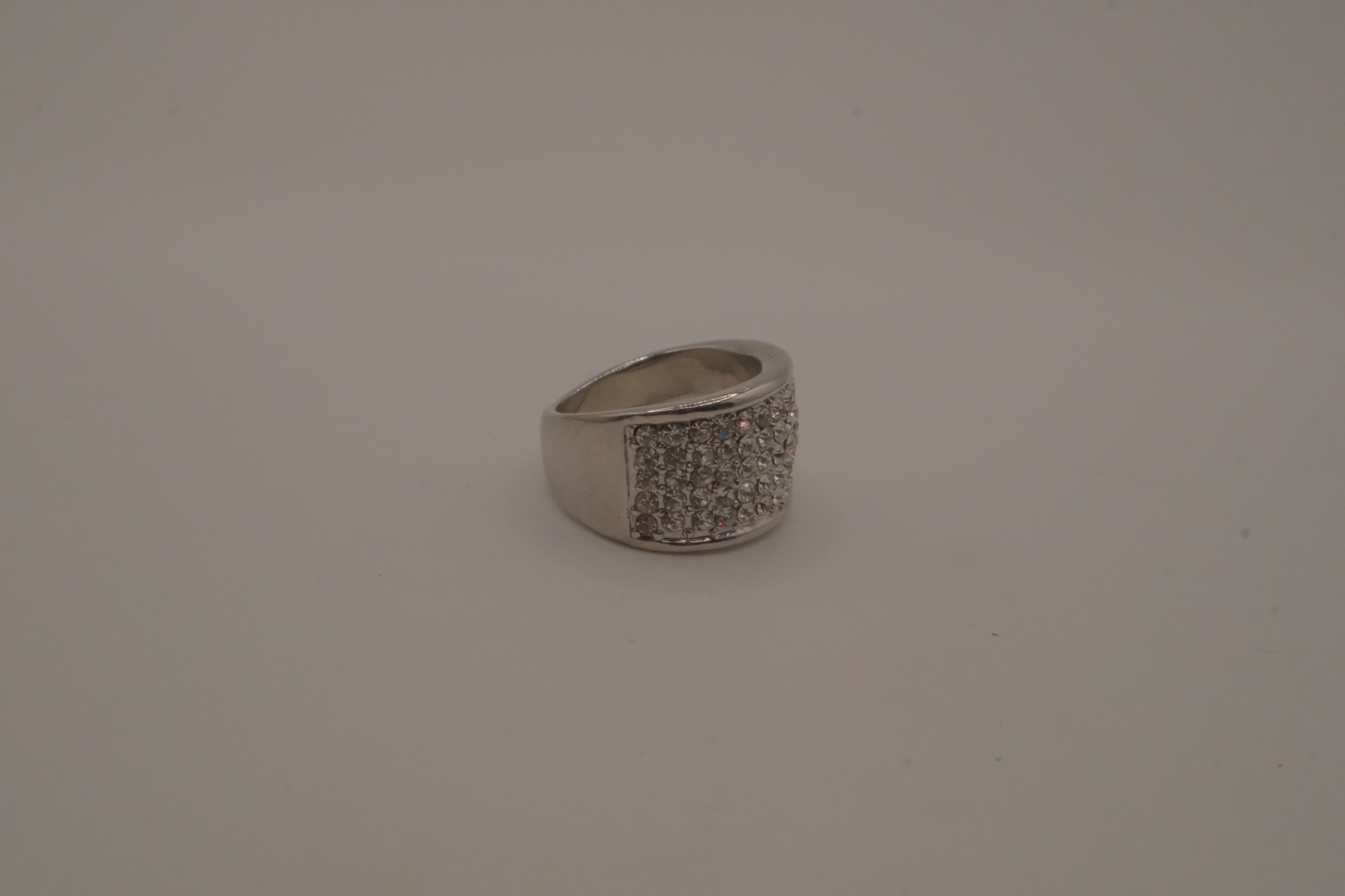 Silver tone wide pave cocktail band ring
