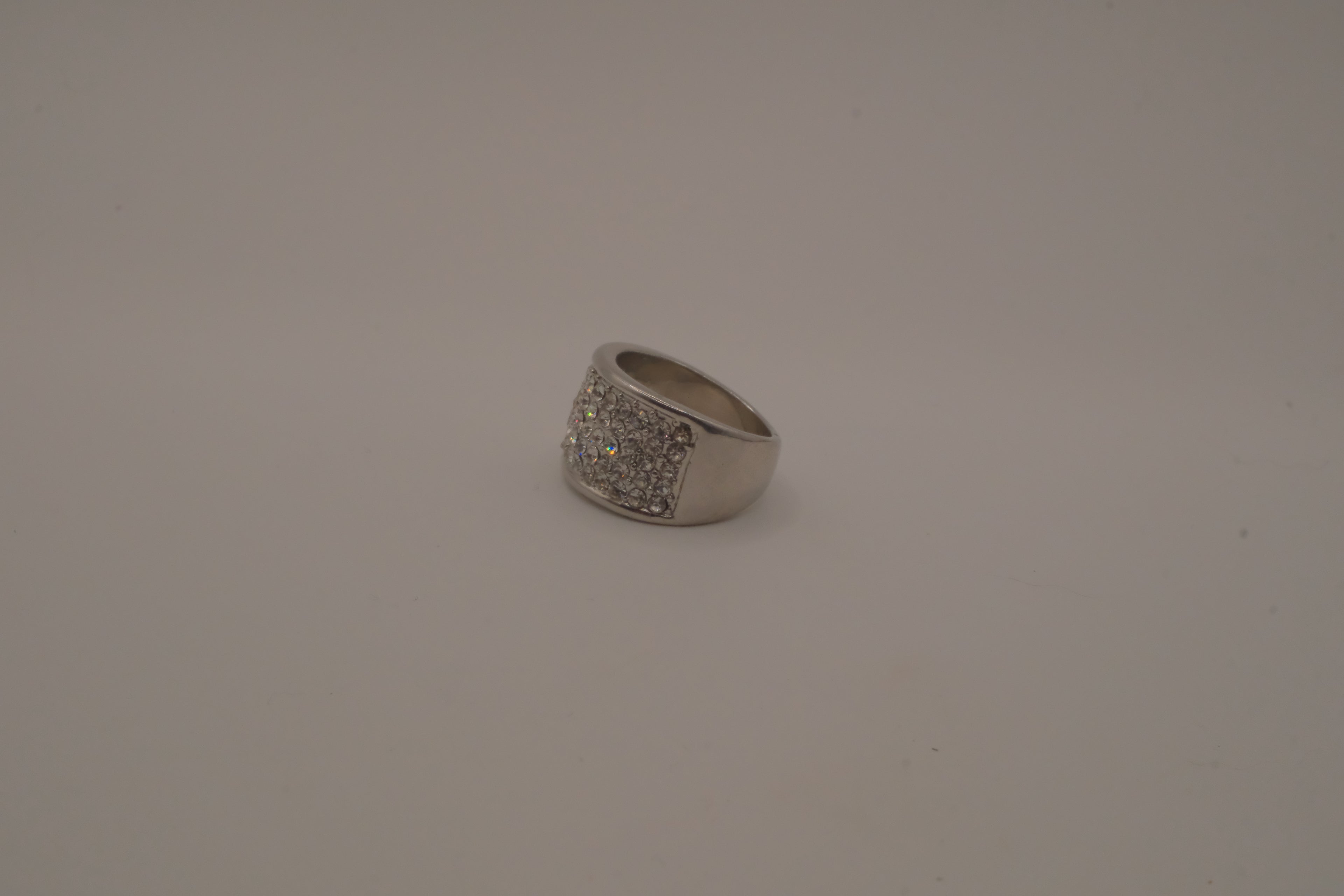 Silver tone wide pave cocktail band ring